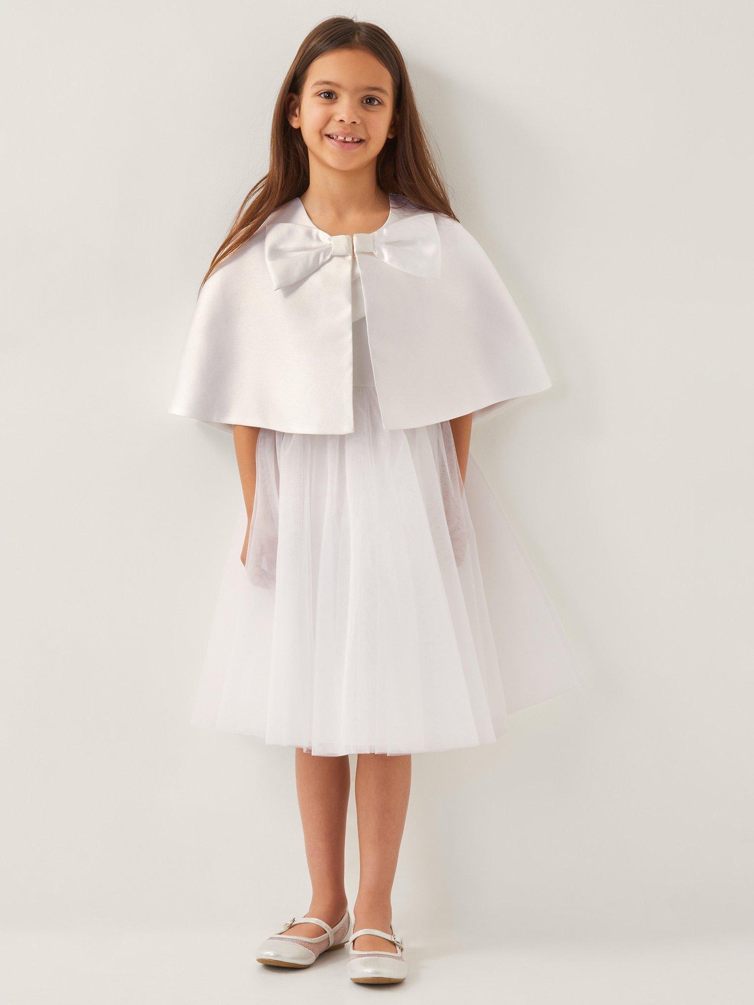 Product image 1 of 4, which shows Monsoon Kids' Bow Twill Cape , Ivory, 3-6 years