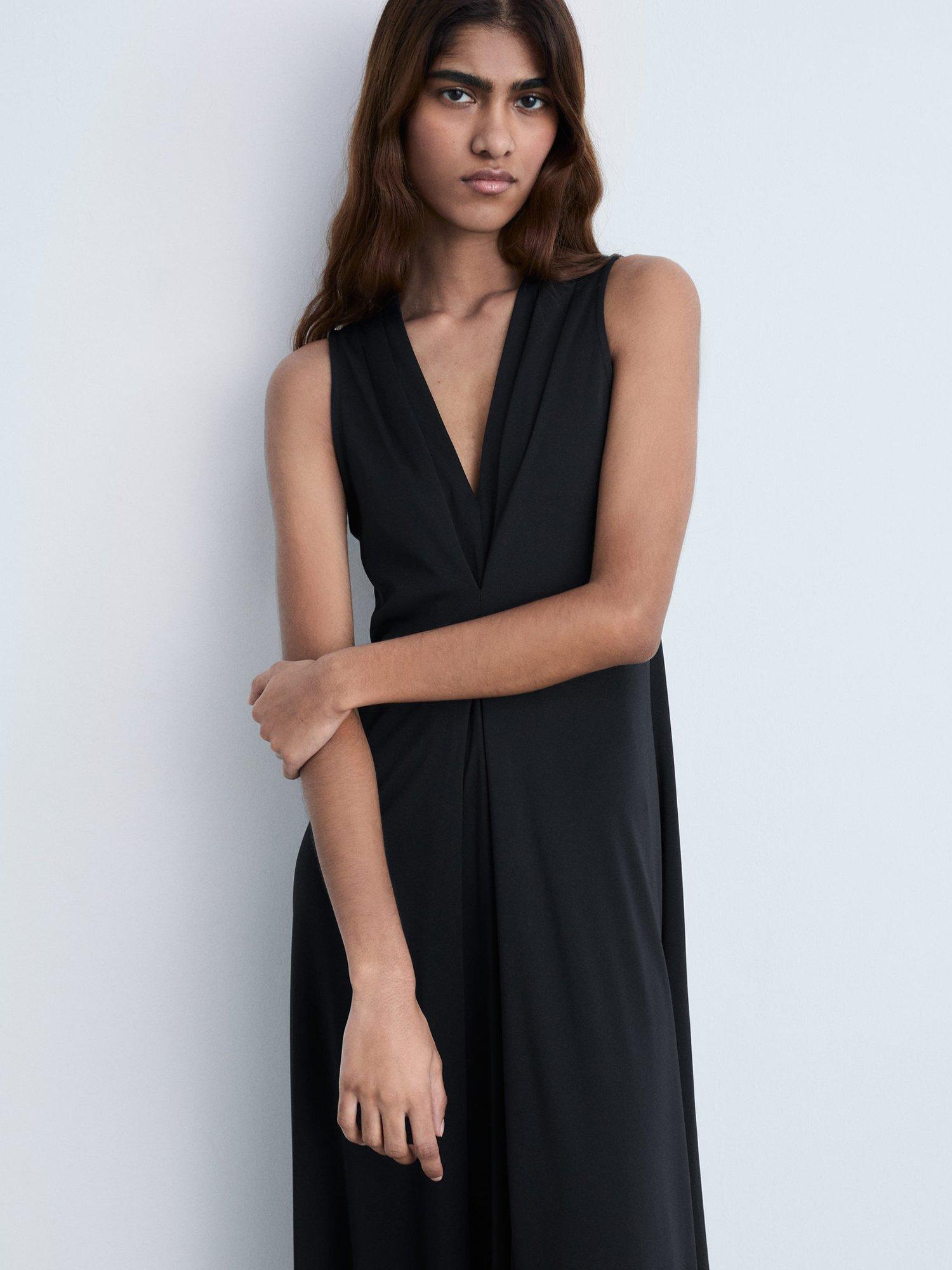 Product image 1 of 7, which shows Mango Marta V-Neck Knitted Midi Dress, Black, 6