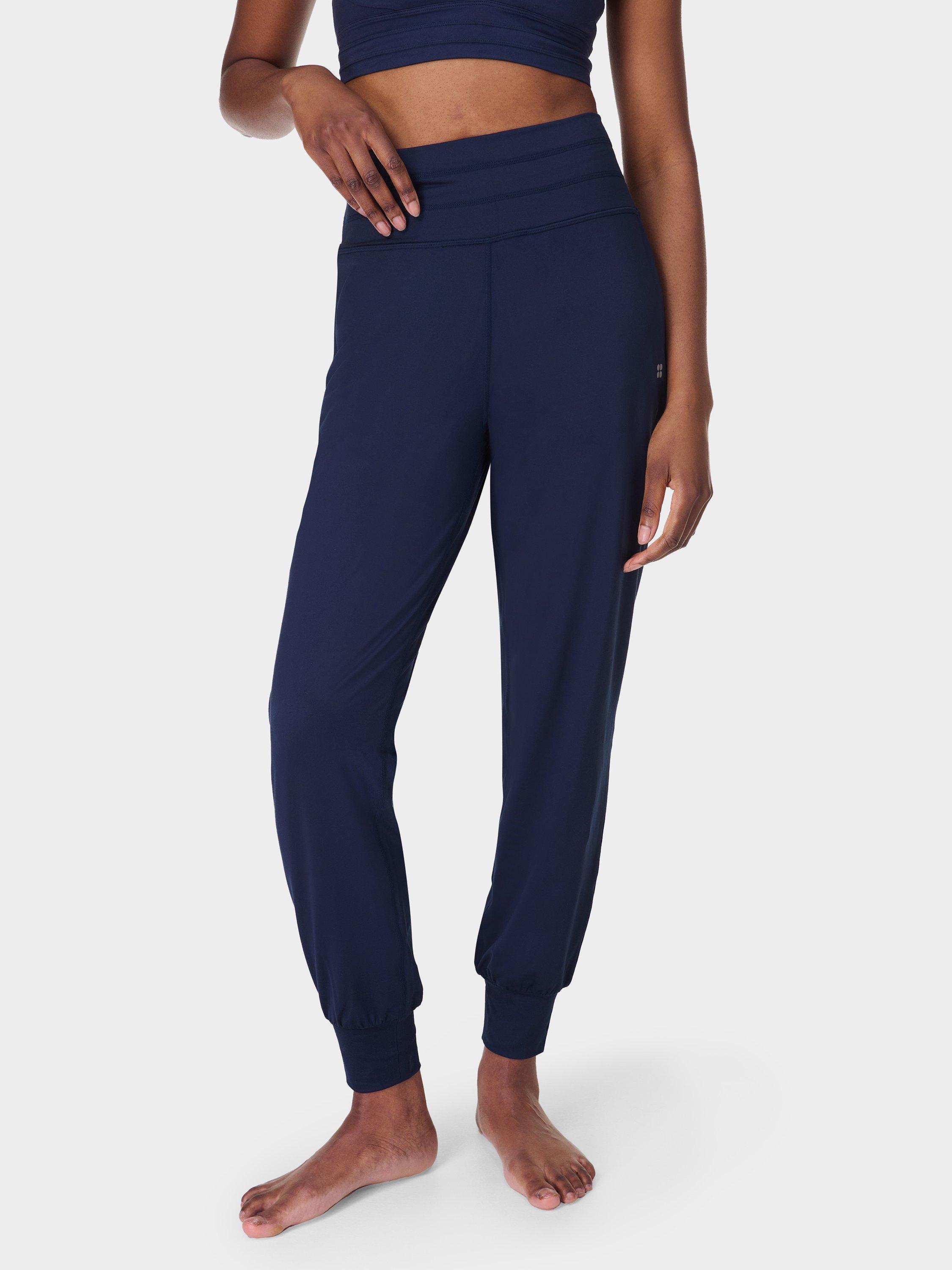 Product image 1 of 6, which shows Sweaty Betty Gaia 27" Performance Yoga Trousers, Navy Blue, XXS
