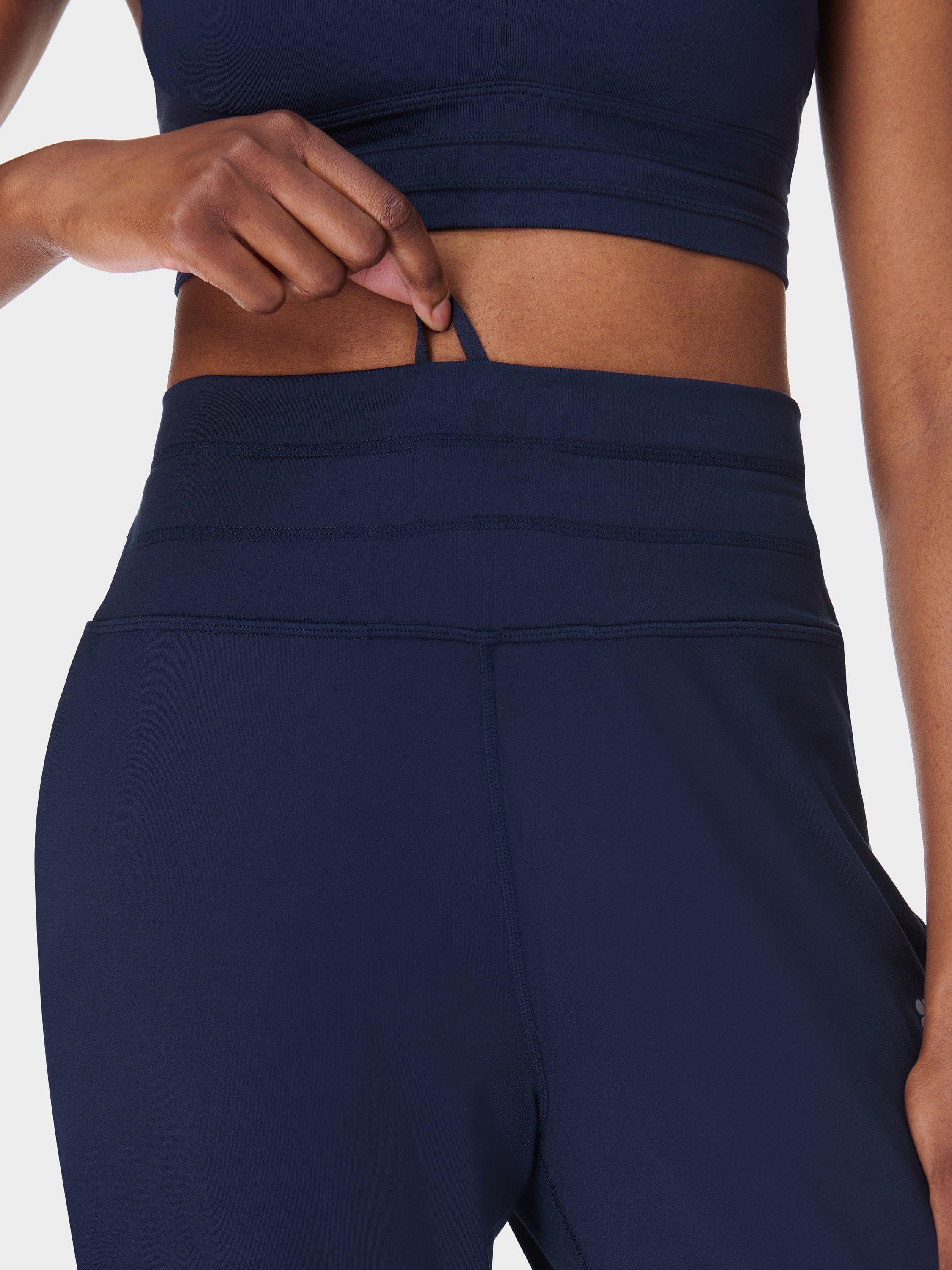 Product image 5 of 6, which shows Sweaty Betty Gaia 27" Performance Yoga Trousers, Navy Blue, XXS