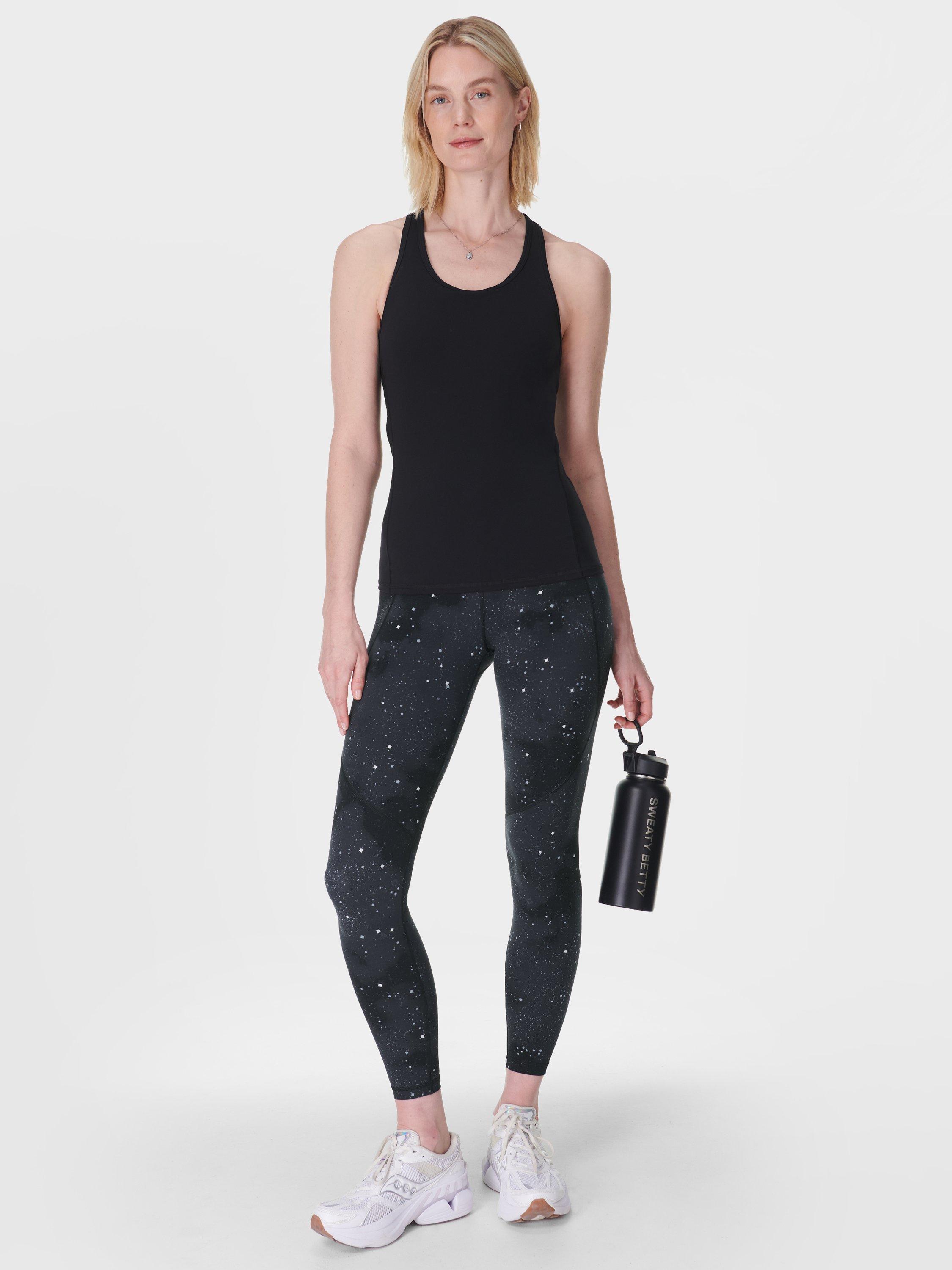Product image 3 of 9, which shows Sweaty Betty Power 7/8 Workout Leggings, Ultra Black Ditsy Star Print, XXS