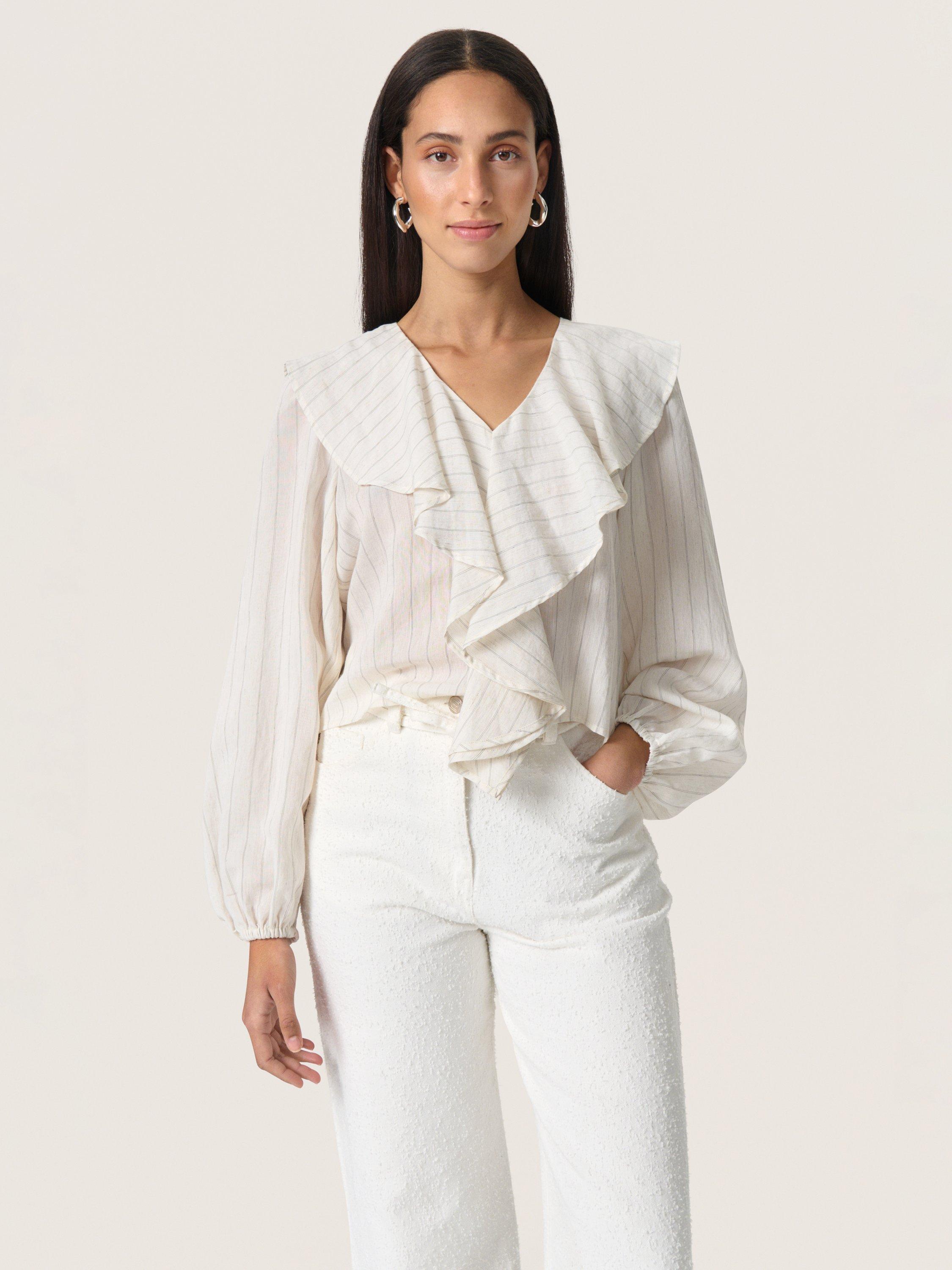 Product image 1 of 6, which shows Soaked In Luxury Roya Ruffle Top, Natural Beige, XS