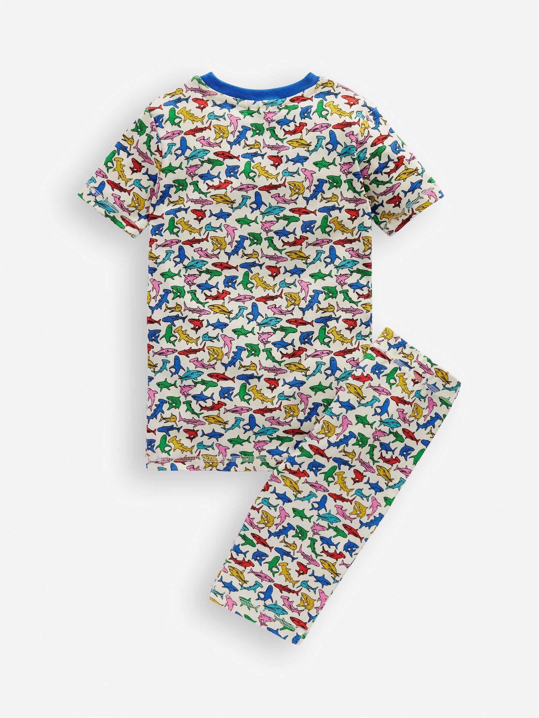 Product image 2 of 3, which shows Mini Boden Kids' Cotton Snug Short John Pyjama Set, Multi Sharks, 2 years