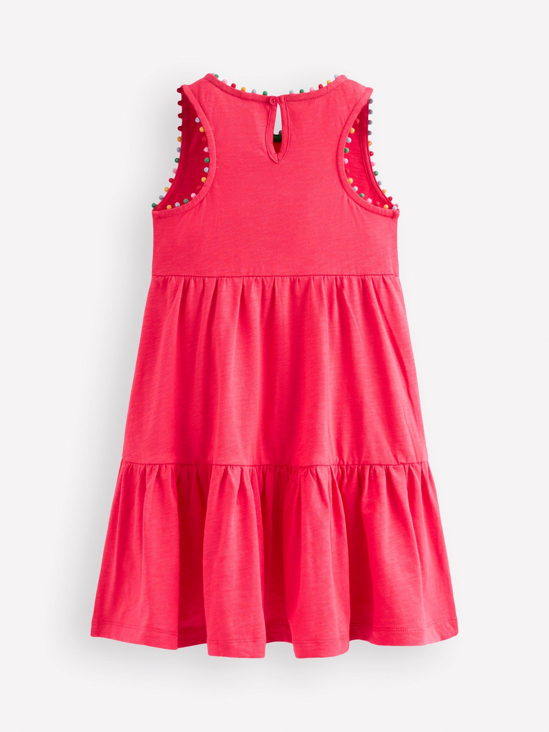 Product image 2 of 2, which shows Mini Boden Kids' Ali Pom Trim Jersey Dress, Camelia Pink, 2-3 years
