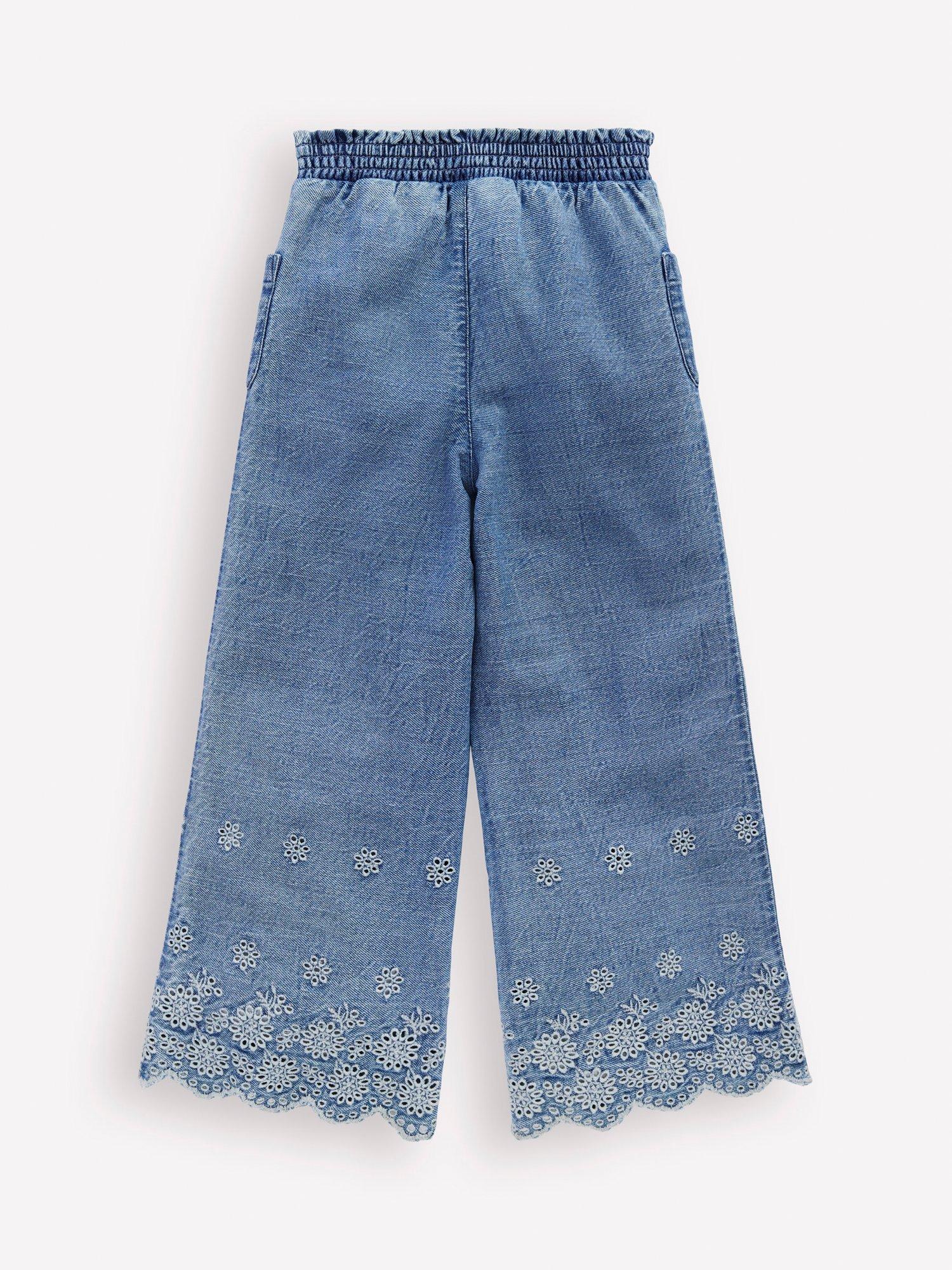 Product image 2 of 3, which shows Mini Boden Kids' Broderie Hem Trousers, Blue Indigo, 2-3 years