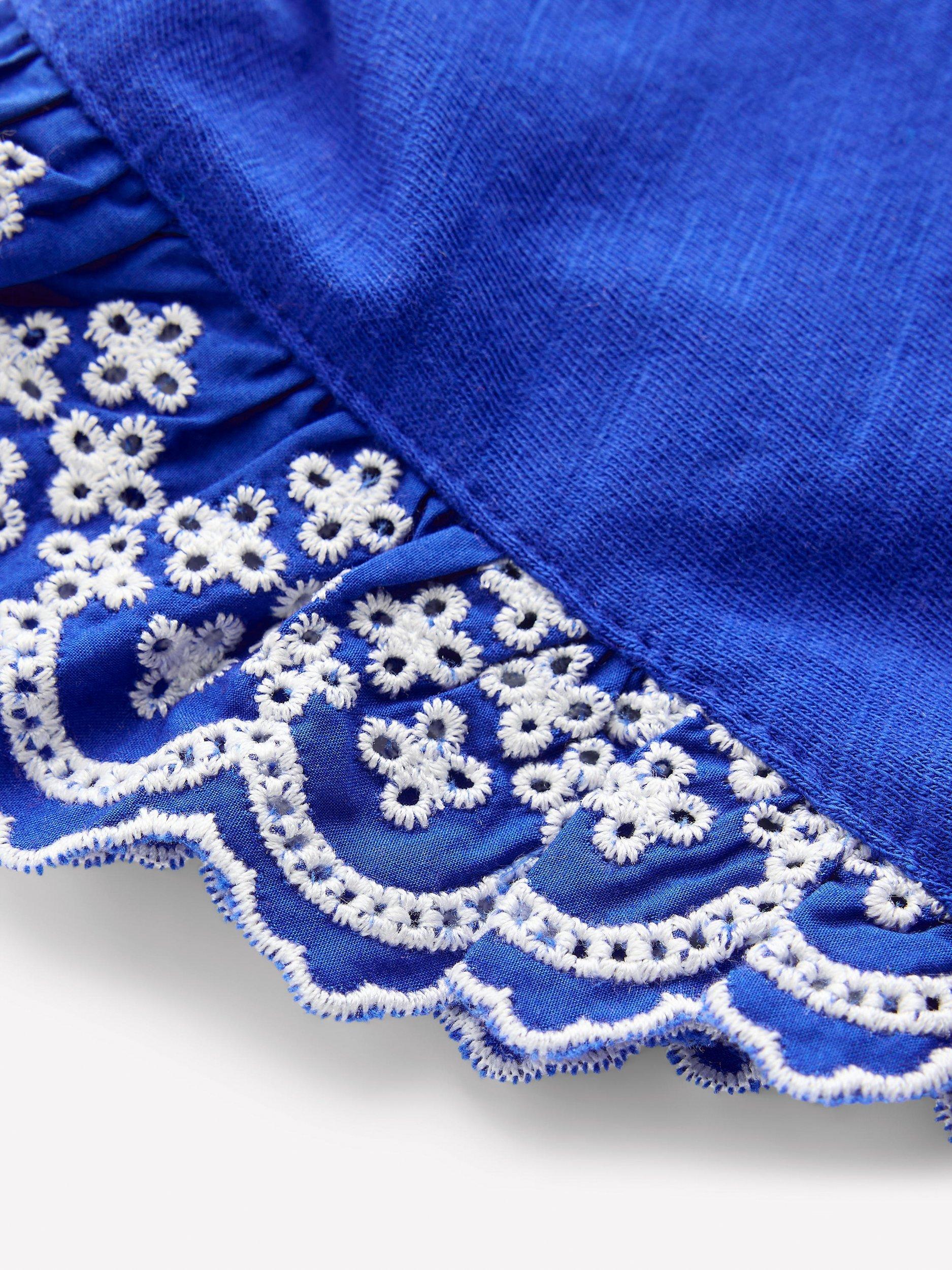 Product image 3 of 3, which shows Mini Boden Kids' Margaret Broderie Frill Sleeveless Cotton Top, Orion Blue, 3-4 years