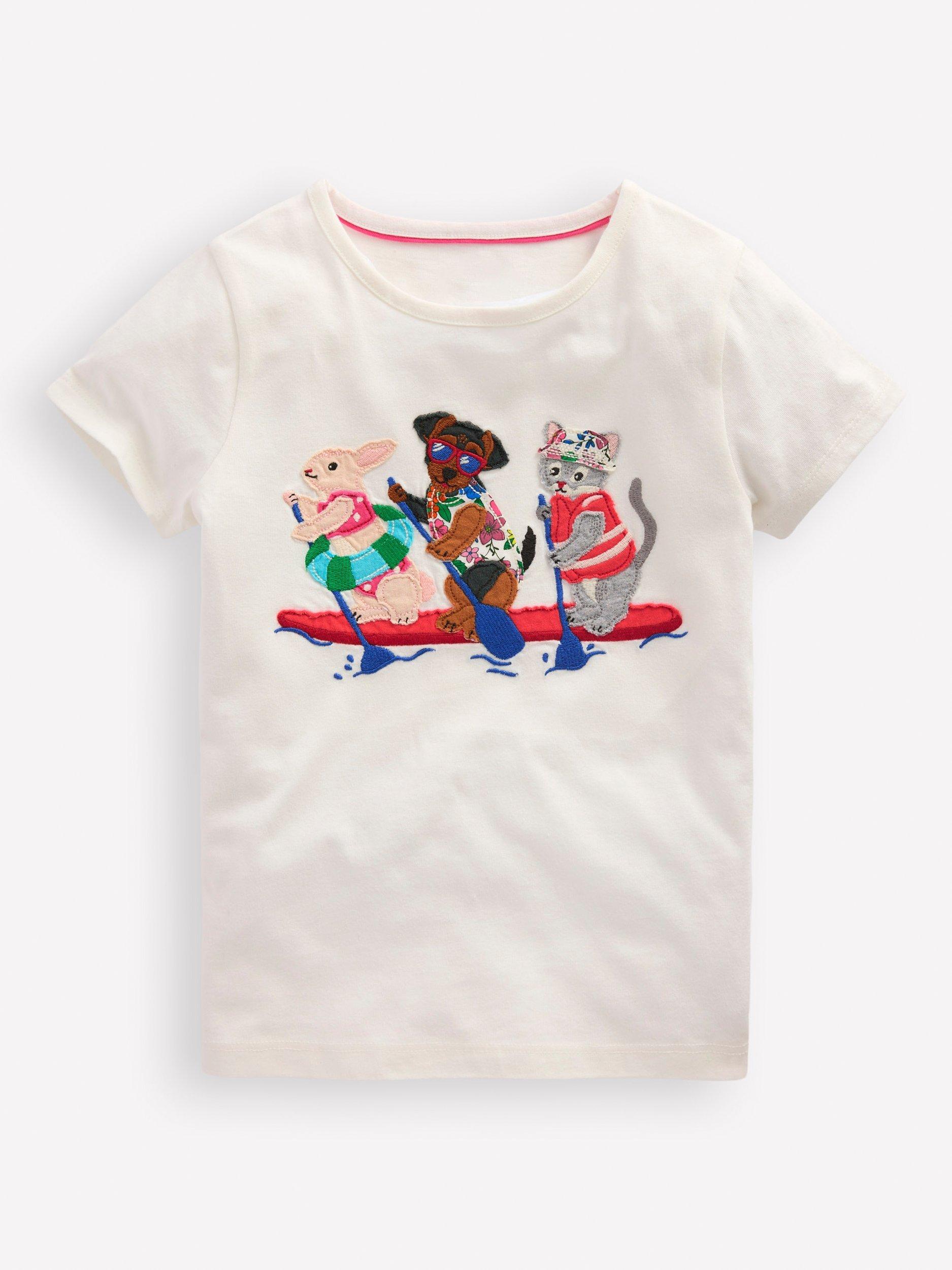 Product image 1 of 3, which shows Mini Boden Kids' Cotton Appliqué Short Sleeve T-Shirt, Ivory Rafting Pets, 3-4 years