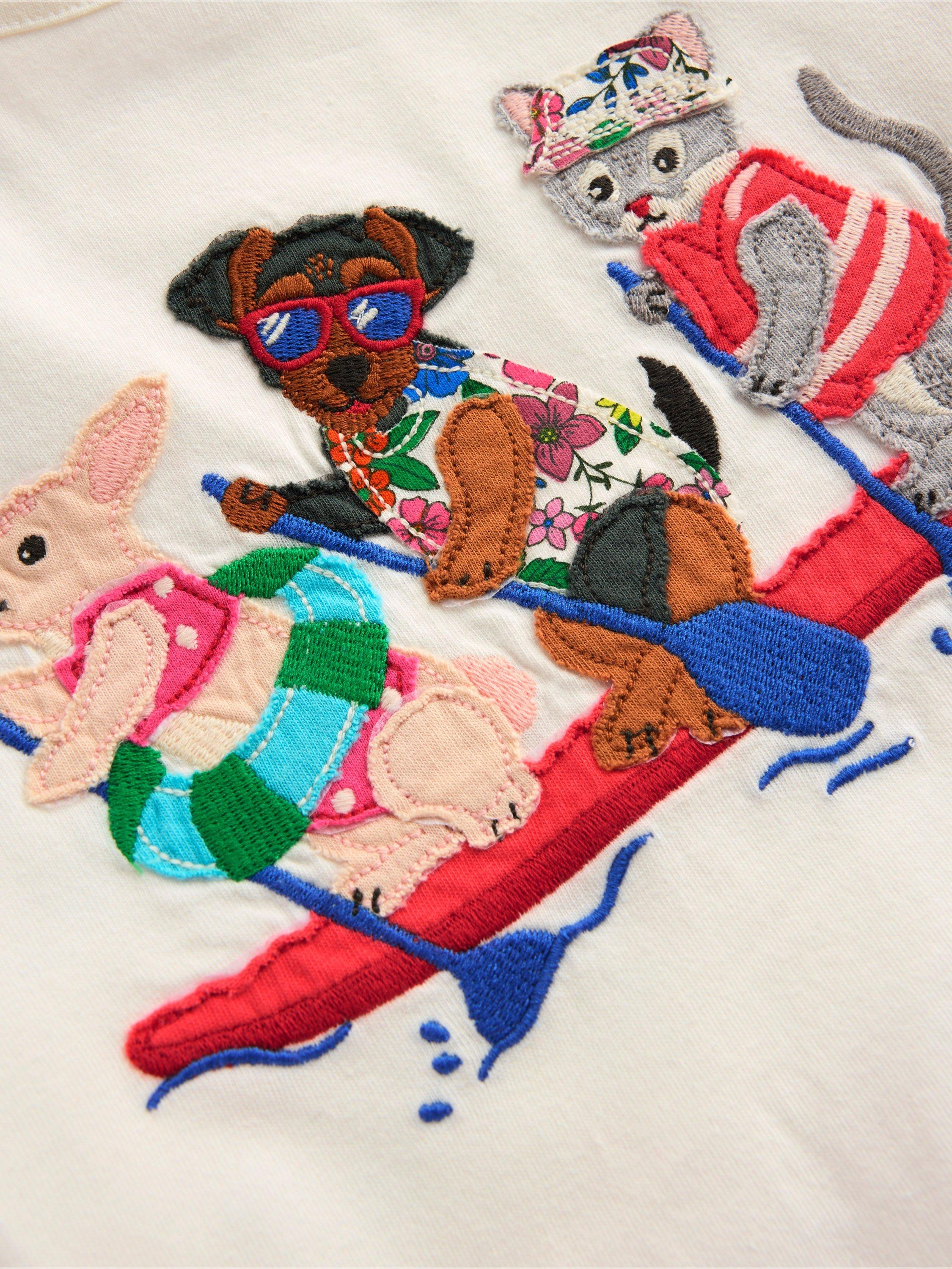 Product image 3 of 3, which shows Mini Boden Kids' Cotton Appliqué Short Sleeve T-Shirt, Ivory Rafting Pets, 3-4 years