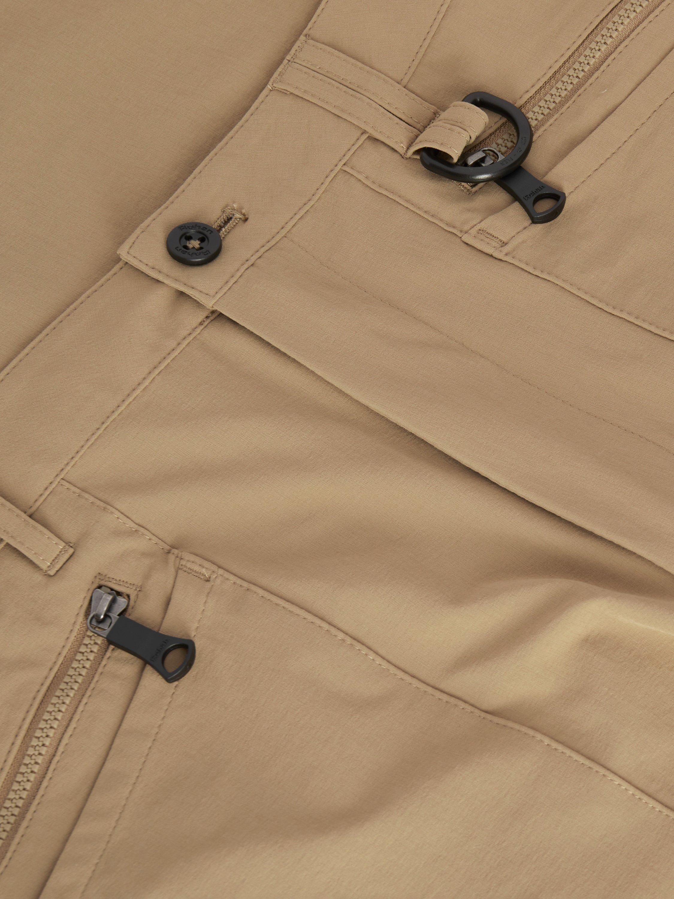 Product image 7 of 7, which shows Rohan Stretch Bags Walking Trousers, Stone, 30S