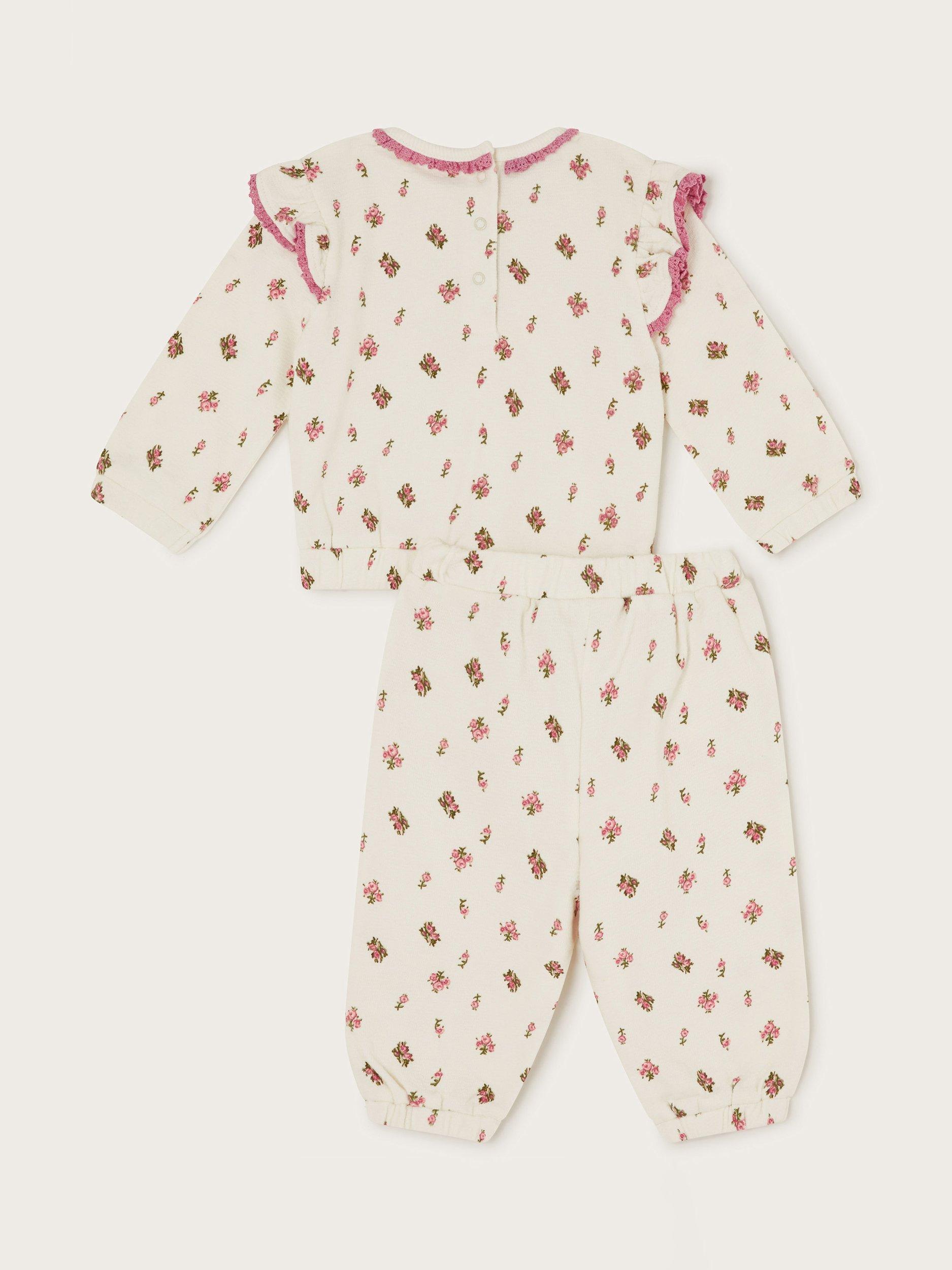 Product image 2 of 3, which shows Monsoon Baby Floral Frill Sweatshirt & Joggers Set, Ivory, 3-6 months