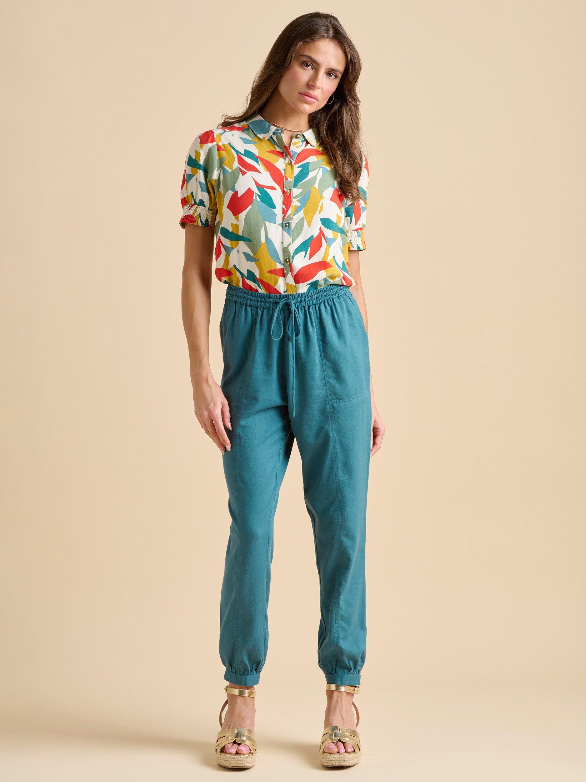 Product image 1 of 5, which shows Brakeburn Cuffed Hem Trousers, Teal, 8