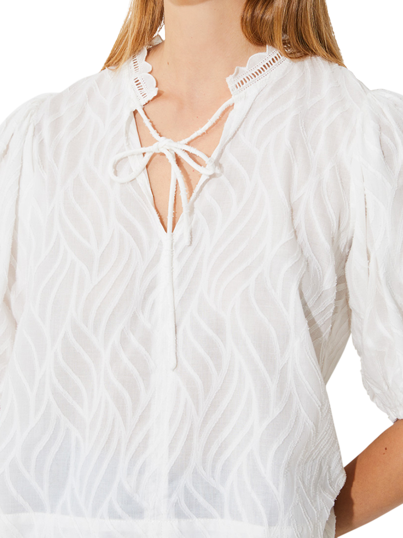 Product image 3 of 4, which shows SUNCOO Luxy Organic Cotton Tie Neck Blouse, White, XS