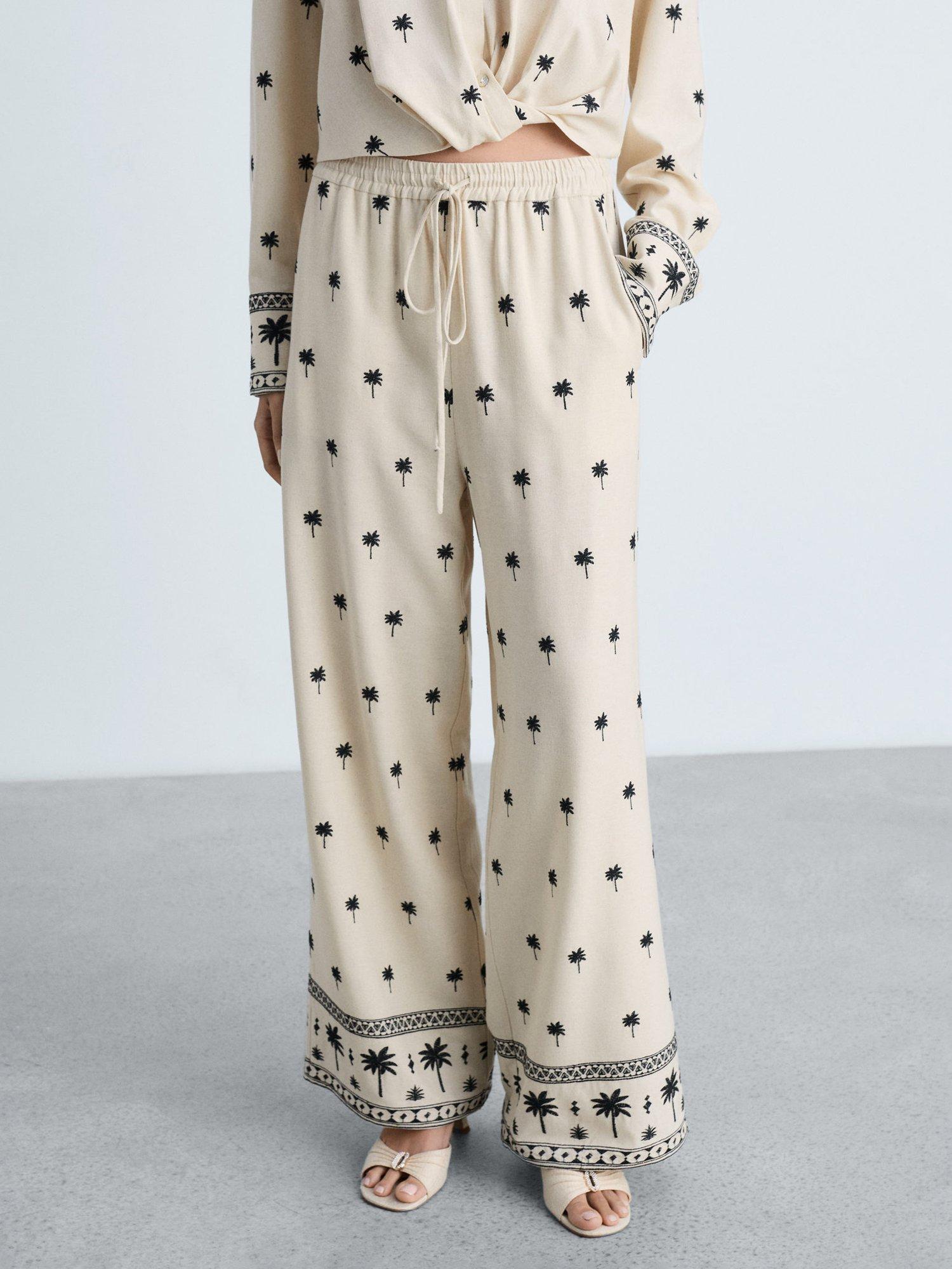 Product image 1 of 7, which shows Mango Embroidered Palm Straight Trousers, Beige/Black, L