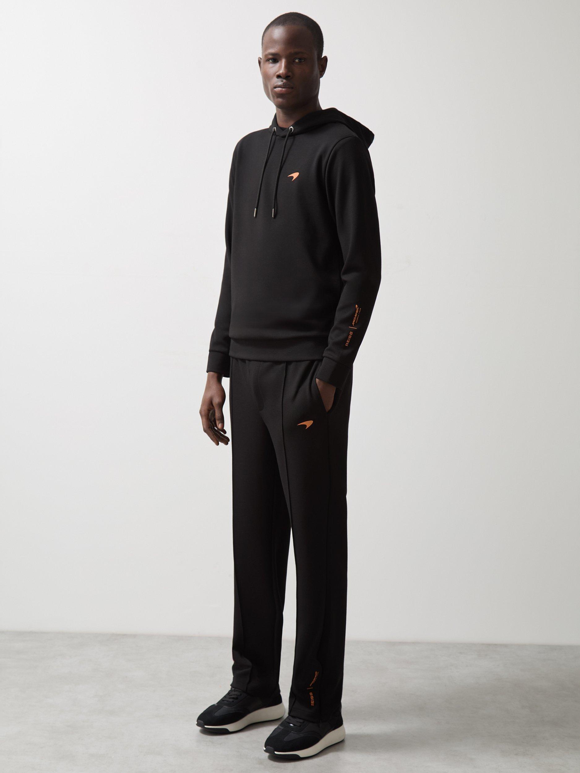 Product image 2 of 5, which shows Reiss x McLaren Borough Interlock Joggers, Black, XS