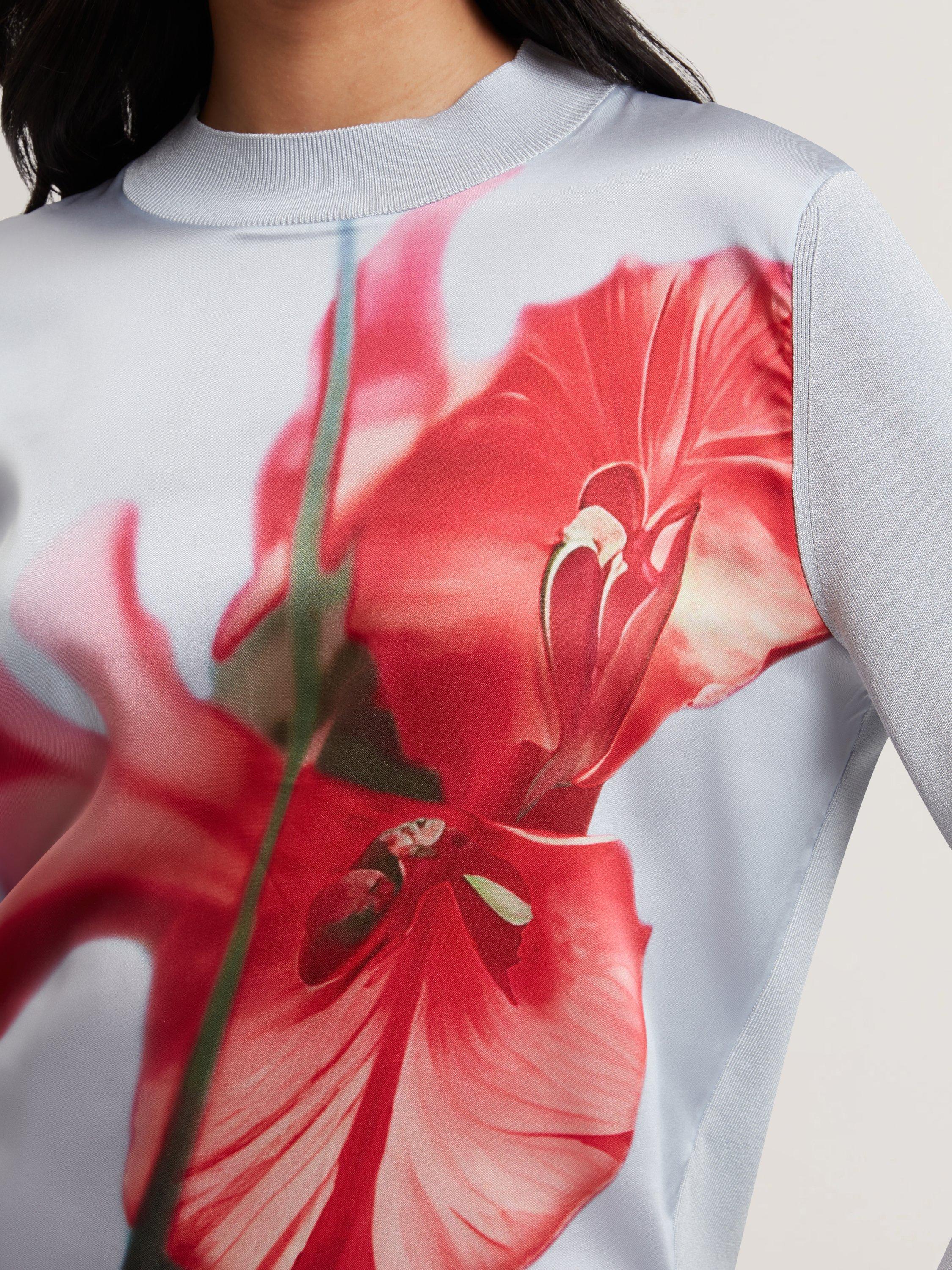 Product image 3 of 6, which shows Ted Baker Eloaa Satin Woven Floral Knit Top, Pale Blue/Red, 6