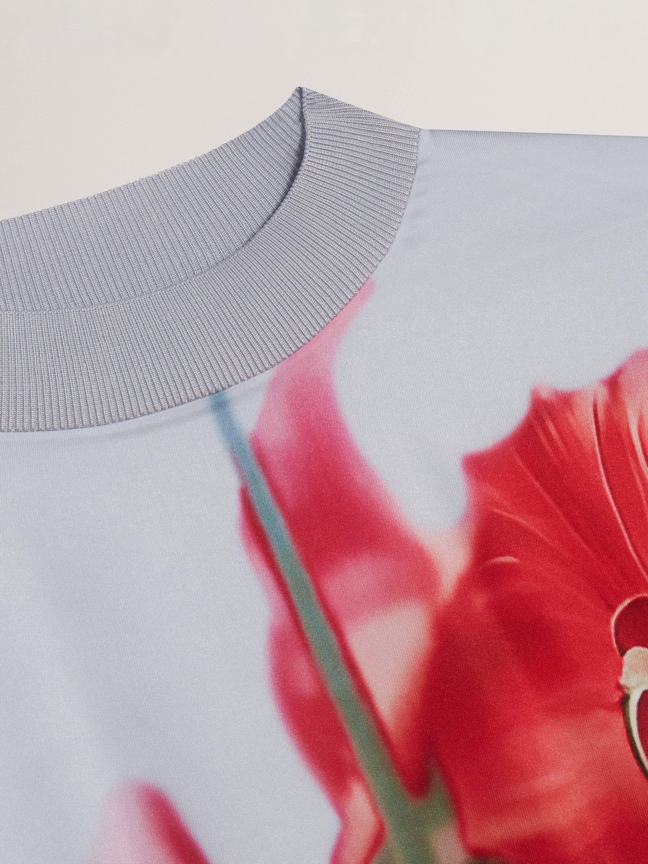 Product image 5 of 6, which shows Ted Baker Eloaa Satin Woven Floral Knit Top, Pale Blue/Red, 6