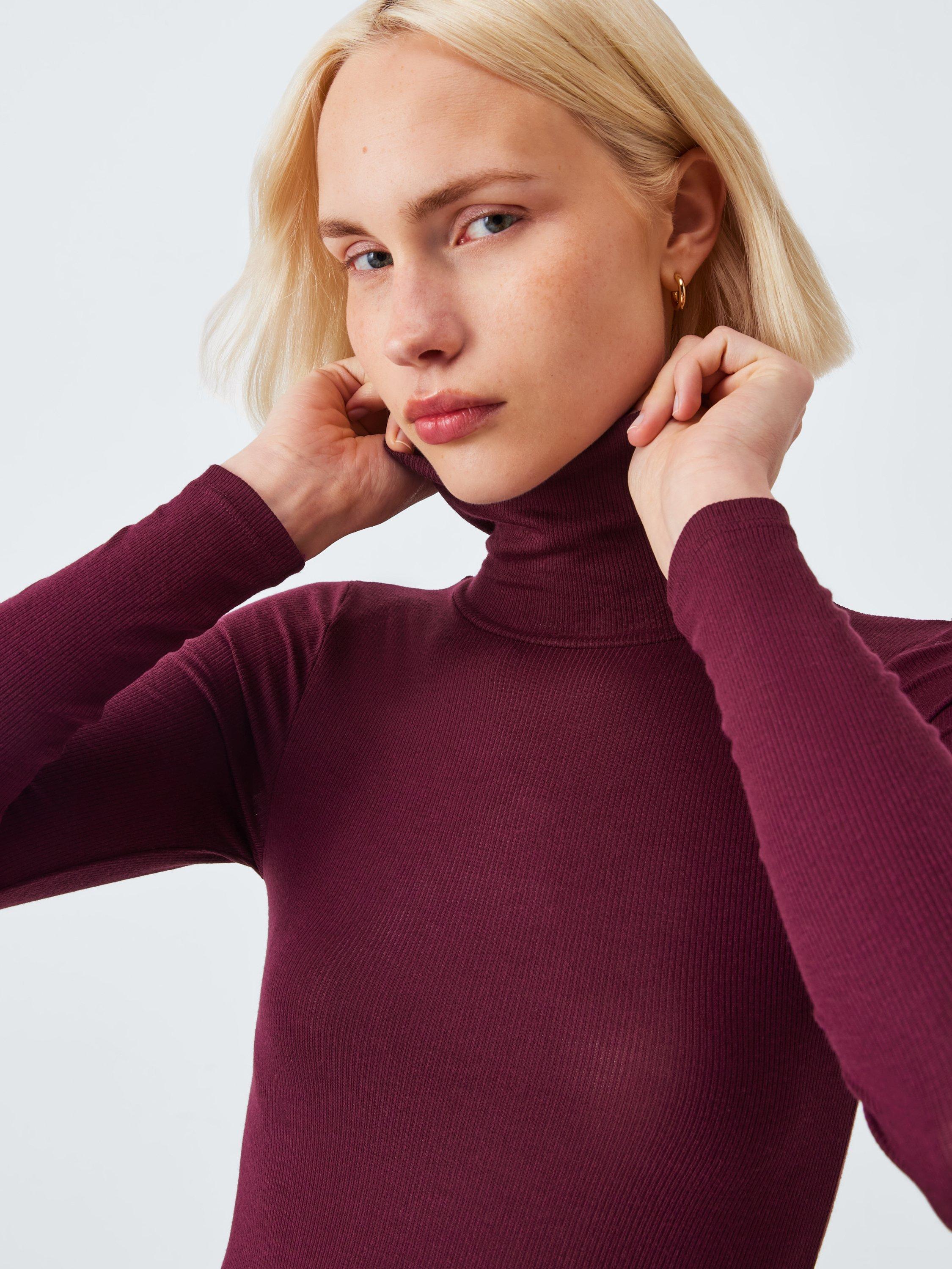 Product image 4 of 5, which shows John Lewis Heat Generating Ribbed Roll Neck Thermal Top, Fig, 8-10