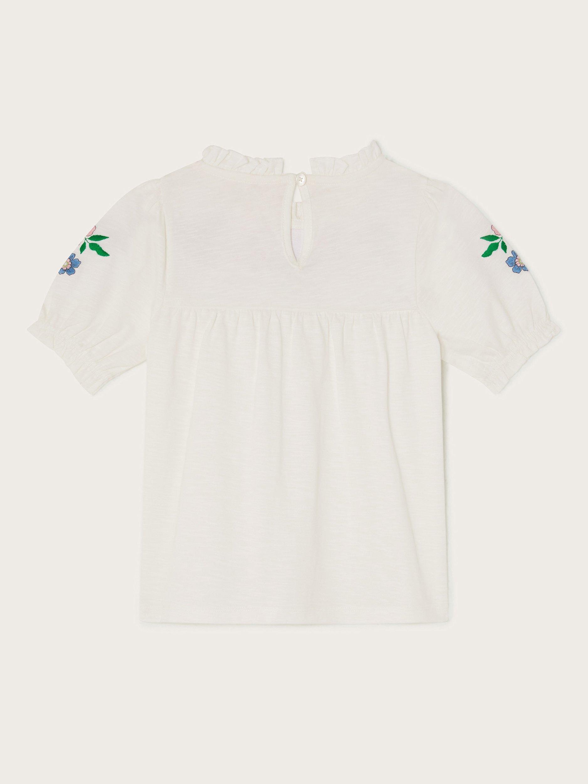 Product image 2 of 3, which shows Monsoon Kids' Cotton Embroidered Dove Top, Ivory, 5-6 years