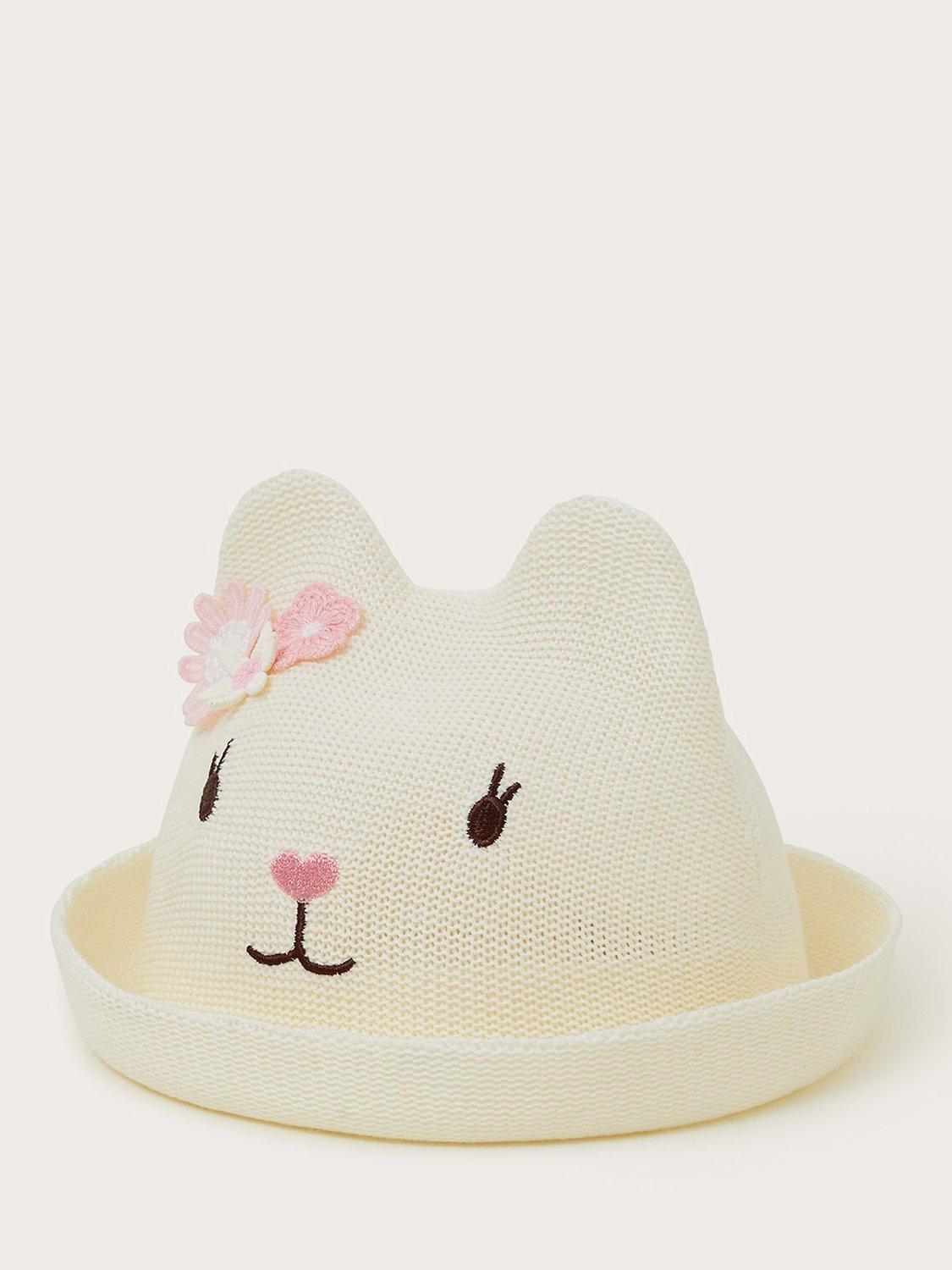Product image 1 of 3, which shows Monsoon Baby Knitted Cat Hat, White, 0-6 months