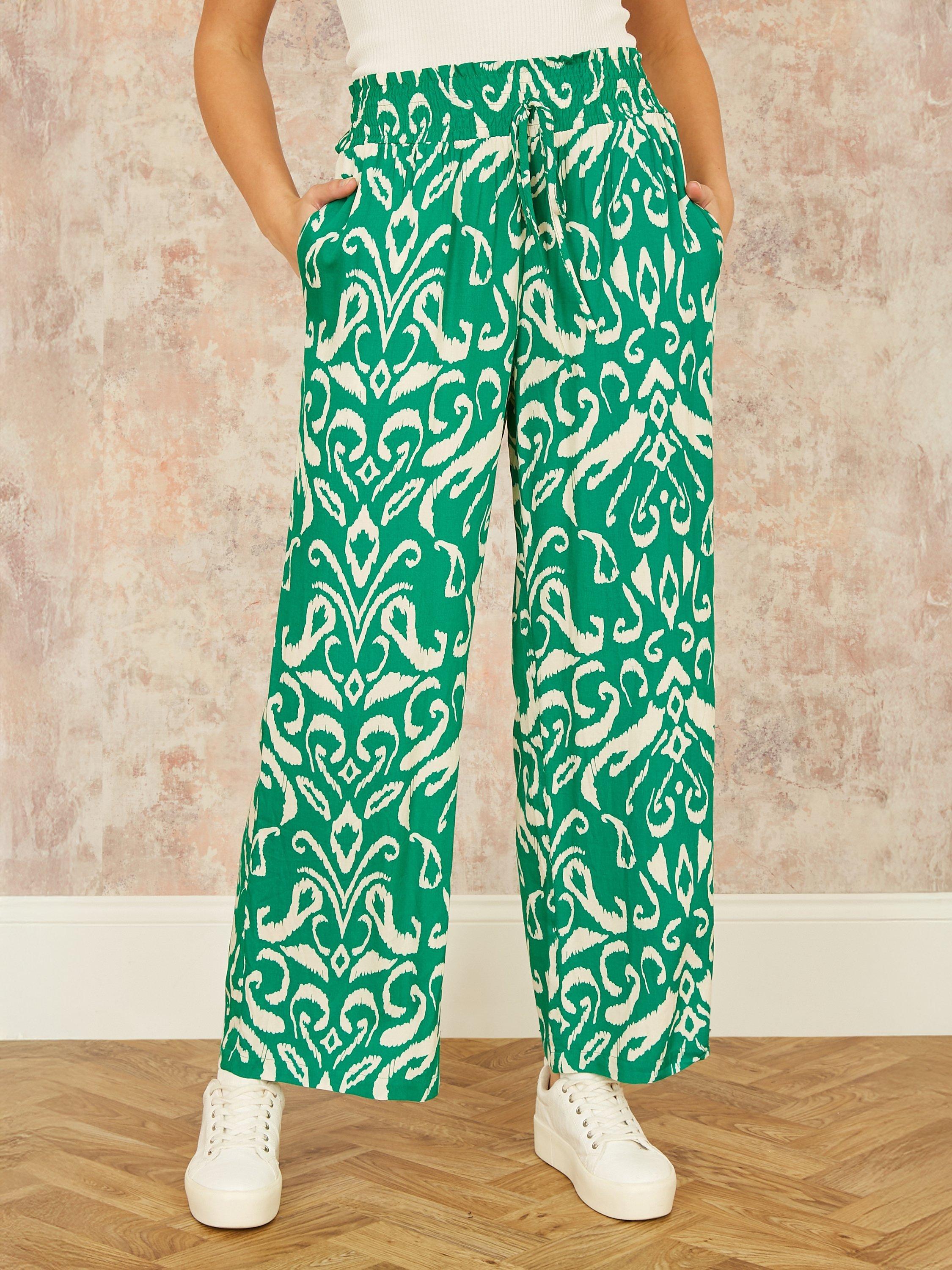 Product image 2 of 4, which shows Yumi Ikat Print Relaxed Fit Trousers, Green, 8