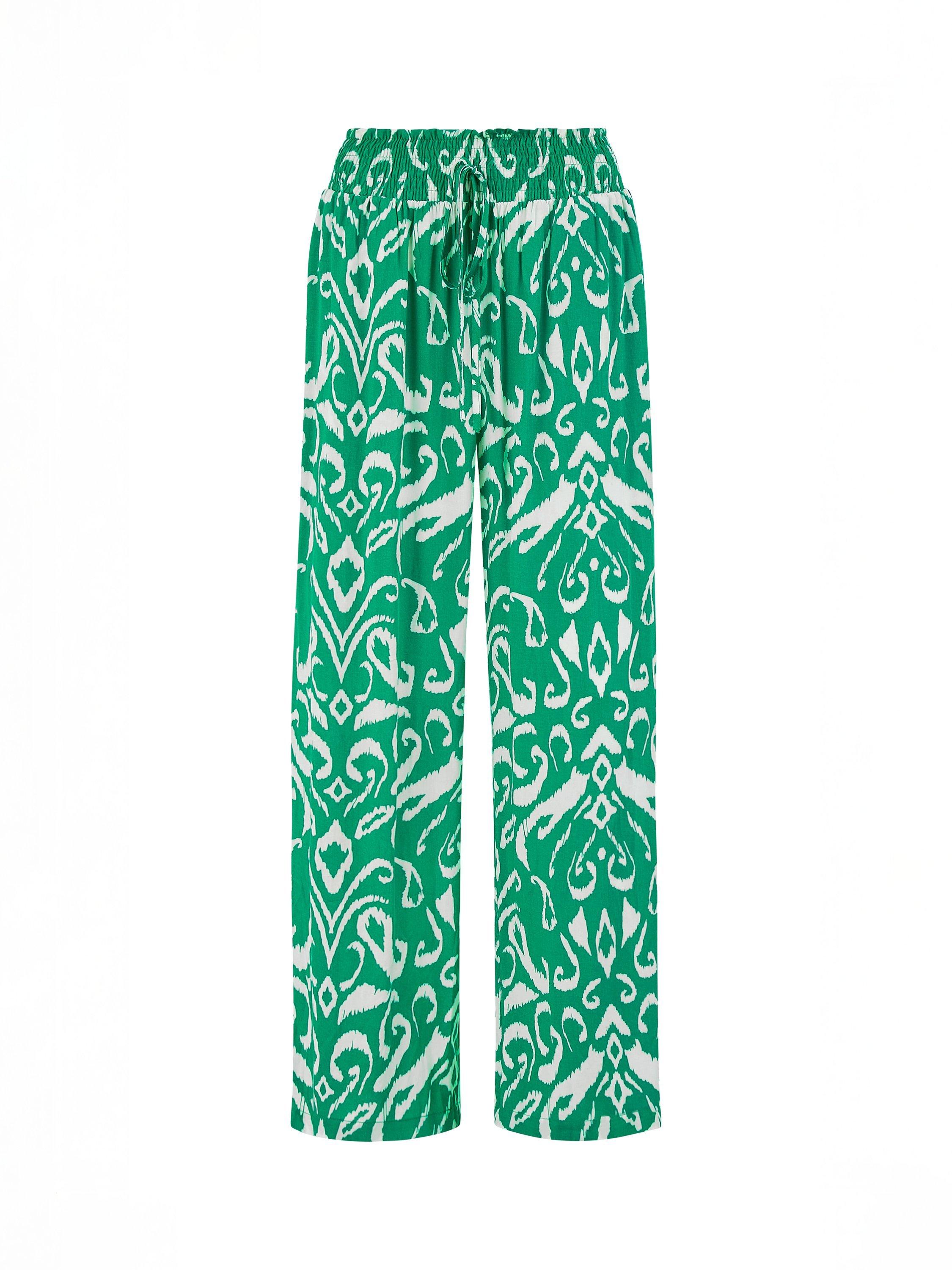 Product image 4 of 4, which shows Yumi Ikat Print Relaxed Fit Trousers, Green, 8