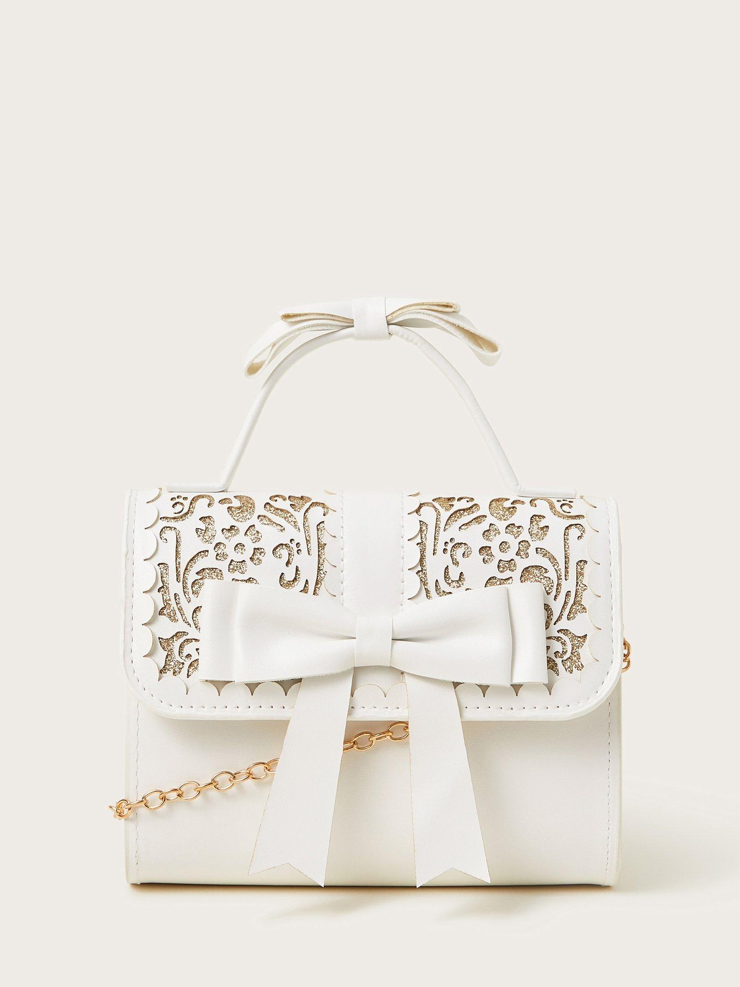Product image 1 of 4, which shows Monsoon Kids' Glitter Bow Bag, White, One Size