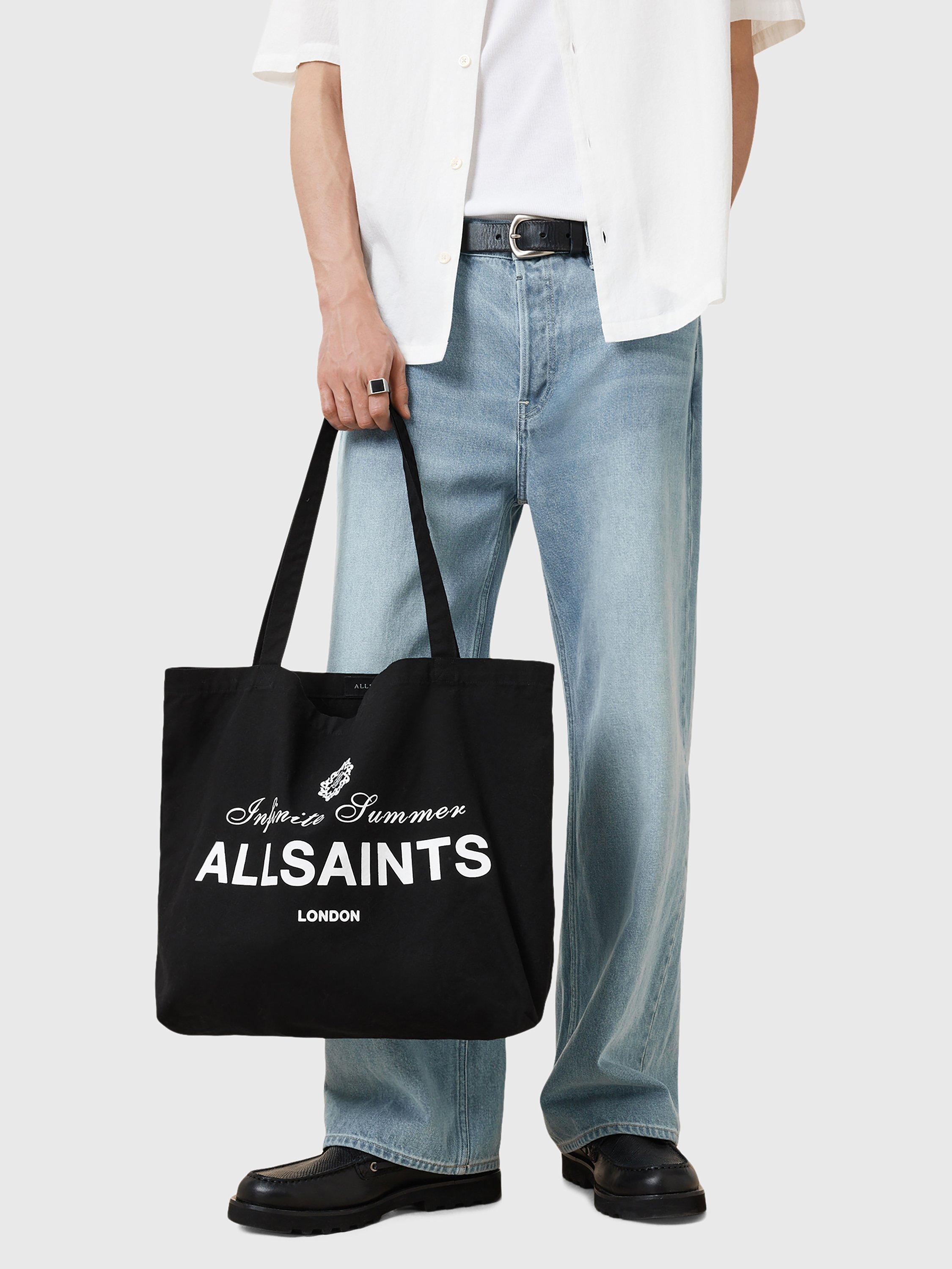Product image 4 of 7, which shows AllSaints Soleil Grpahic Canvas Tote Bag, Washed Black