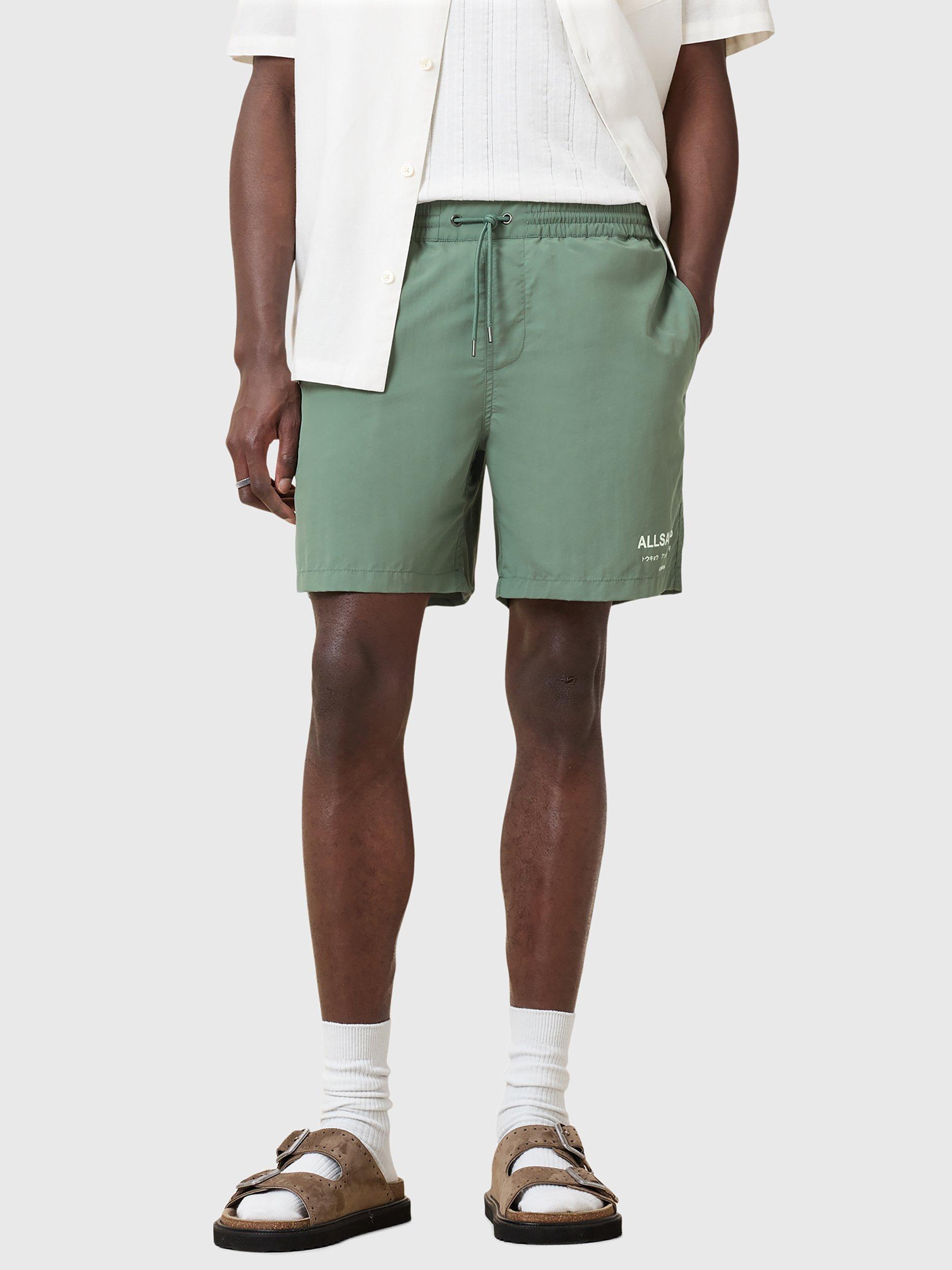Product image 1 of 10, which shows AllSaints Underground Drawstring Swim Shorts, Island Green, S
