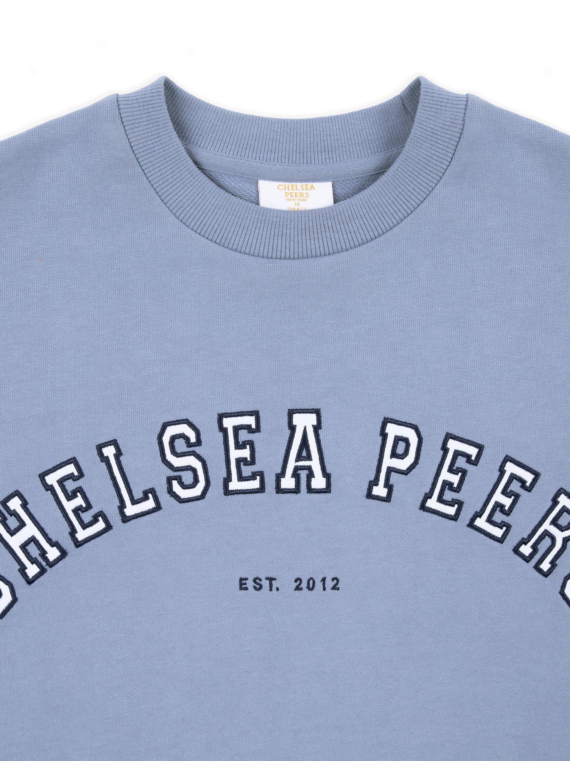 Product image 6 of 6, which shows Chelsea Peers Varsity Logo Pure Organic Cotton Sweatshirt, Petrol Blue, 6