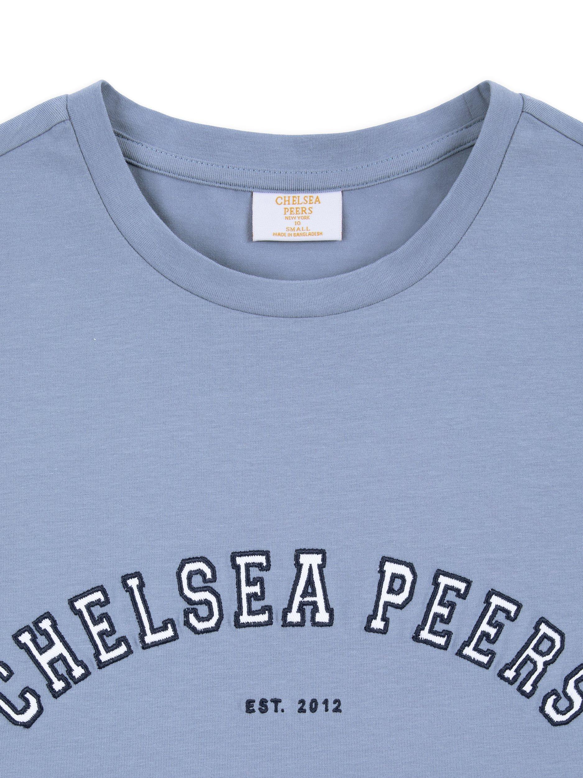 Product image 3 of 3, which shows Chelsea Peers Varsity Logo Pure Organic Cotton T-Shirt, Petrol Blue, 18