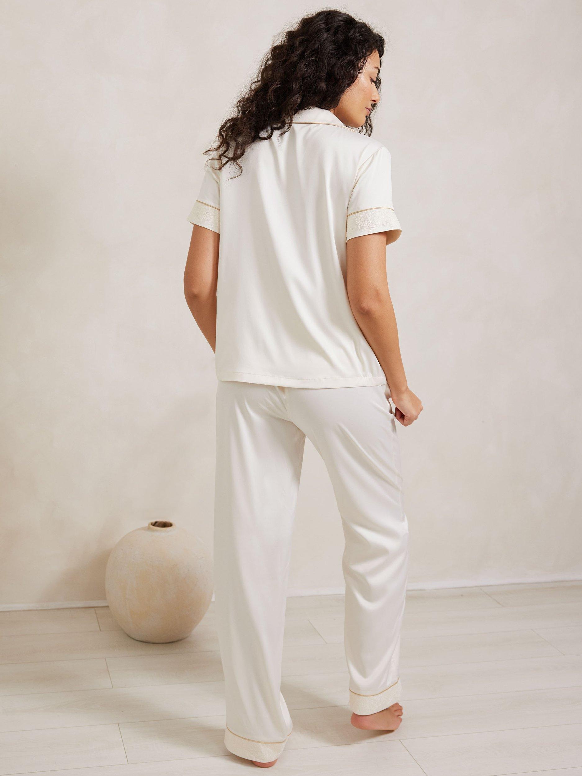 Product image 4 of 5, which shows Chelsea Peers Satin Lace Trim Pyjama Set, Ivory, 6