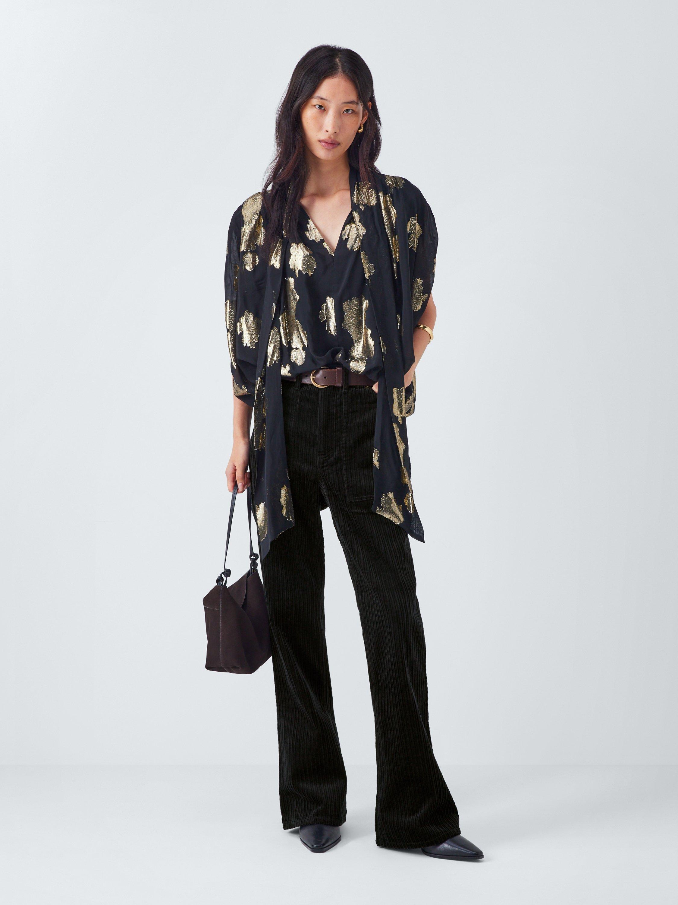 Product image 3 of 6, which shows AND/OR Mid Rise Flared Corduroy Trousers, Black, 6