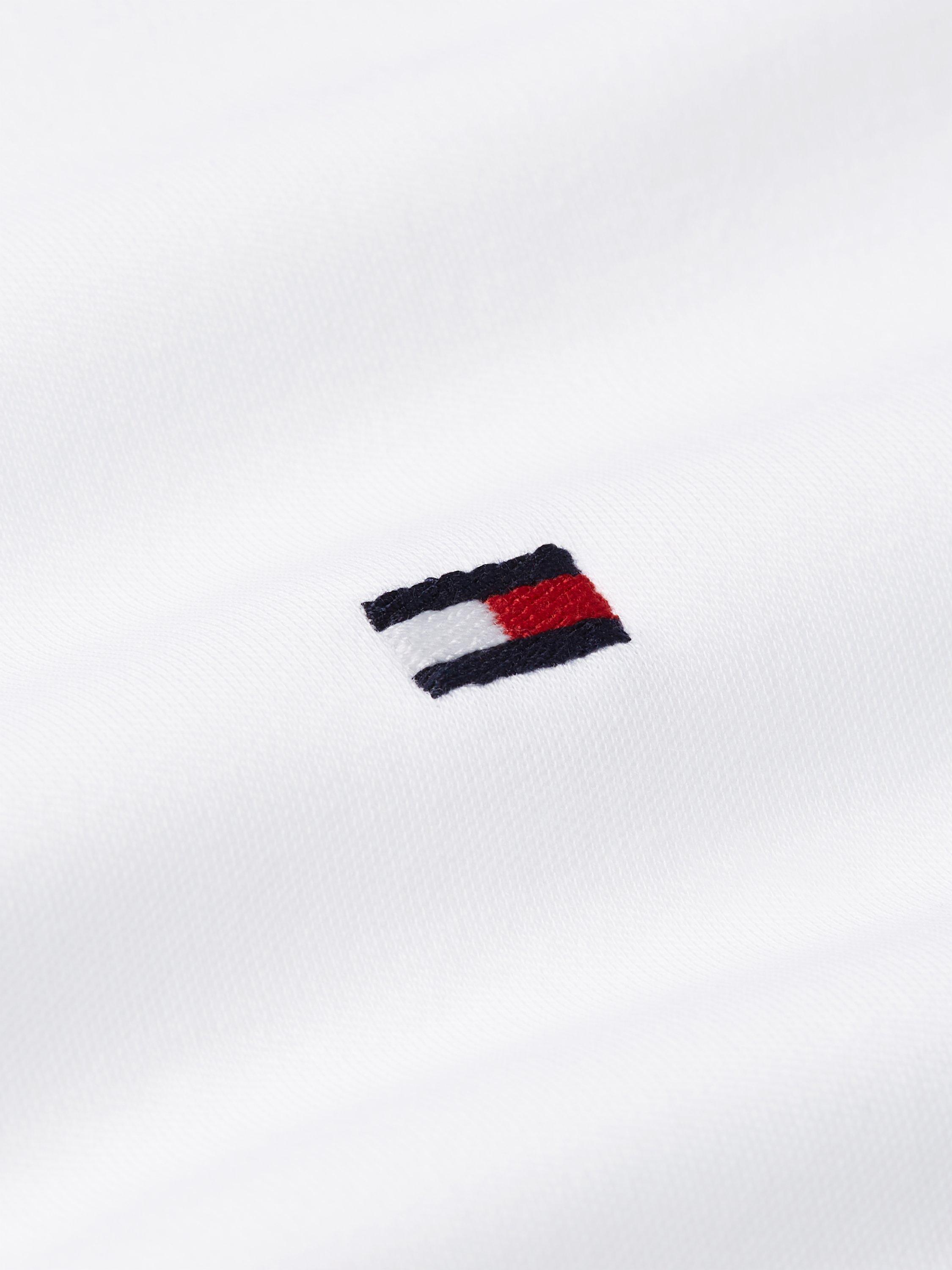 Product image 5 of 7, which shows Tommy Hilfiger Liquid Cotton Blend Regular Fit Short Sleeve Polo Shirt, White, XS