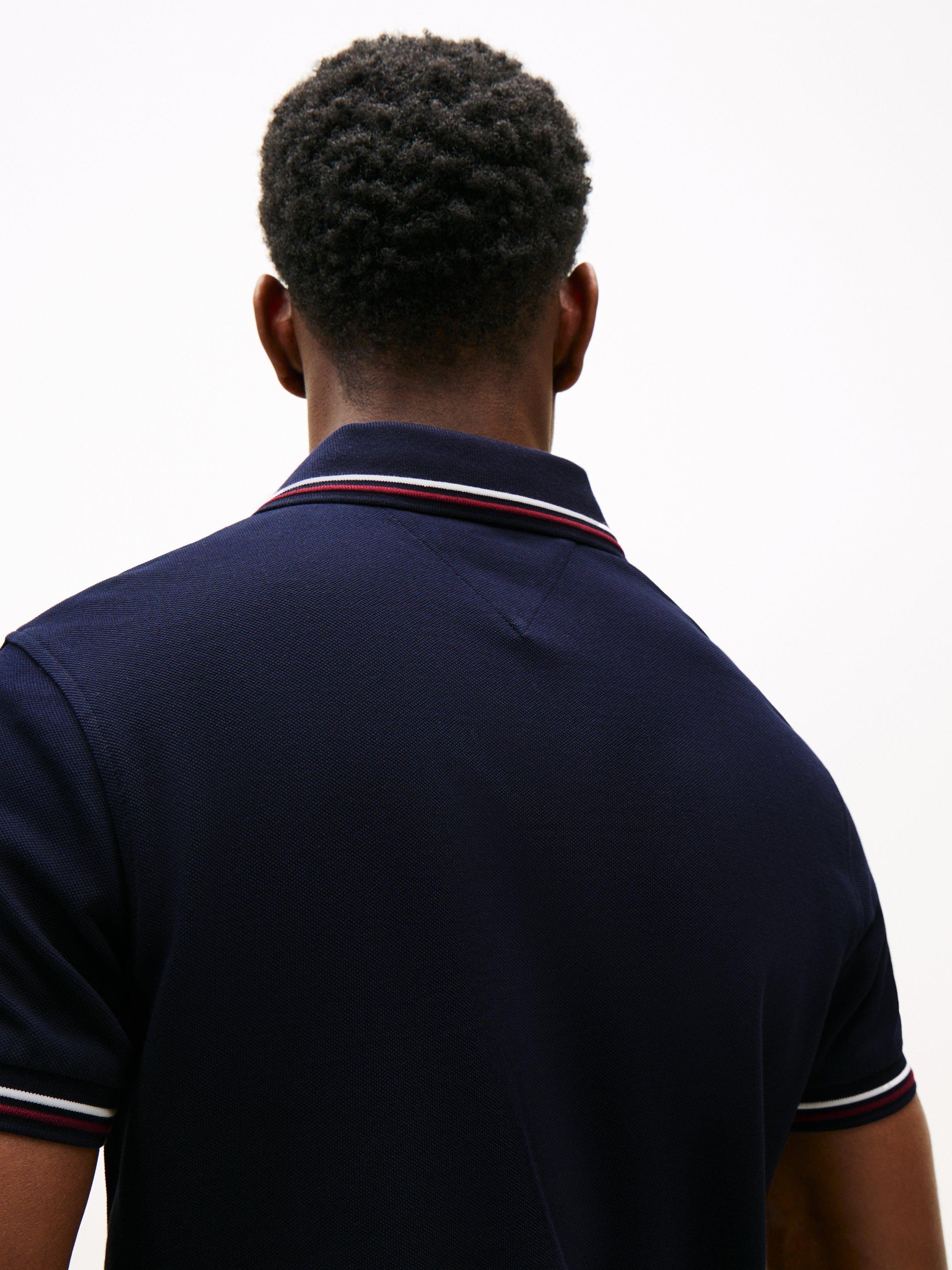 Product image 4 of 5, which shows Tommy Hilfiger Cotton Blend Slim Fit Short Sleeve Tipped Polo Shirt, Navy, XS