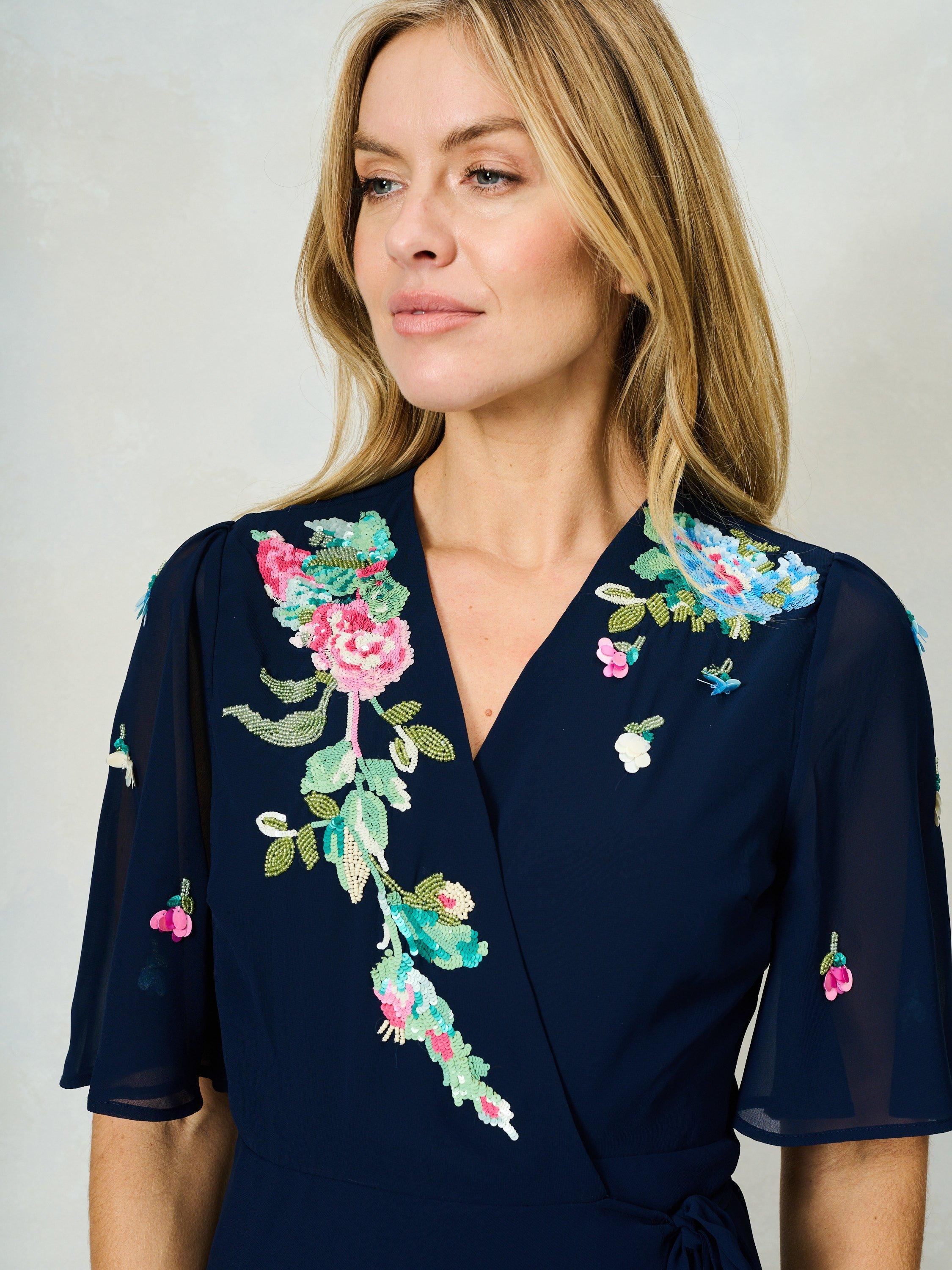 Product image 5 of 5, which shows Hope & Ivy The Jillian Sequin Floral Embellished Wrap Dress, Navy/Multi, 6