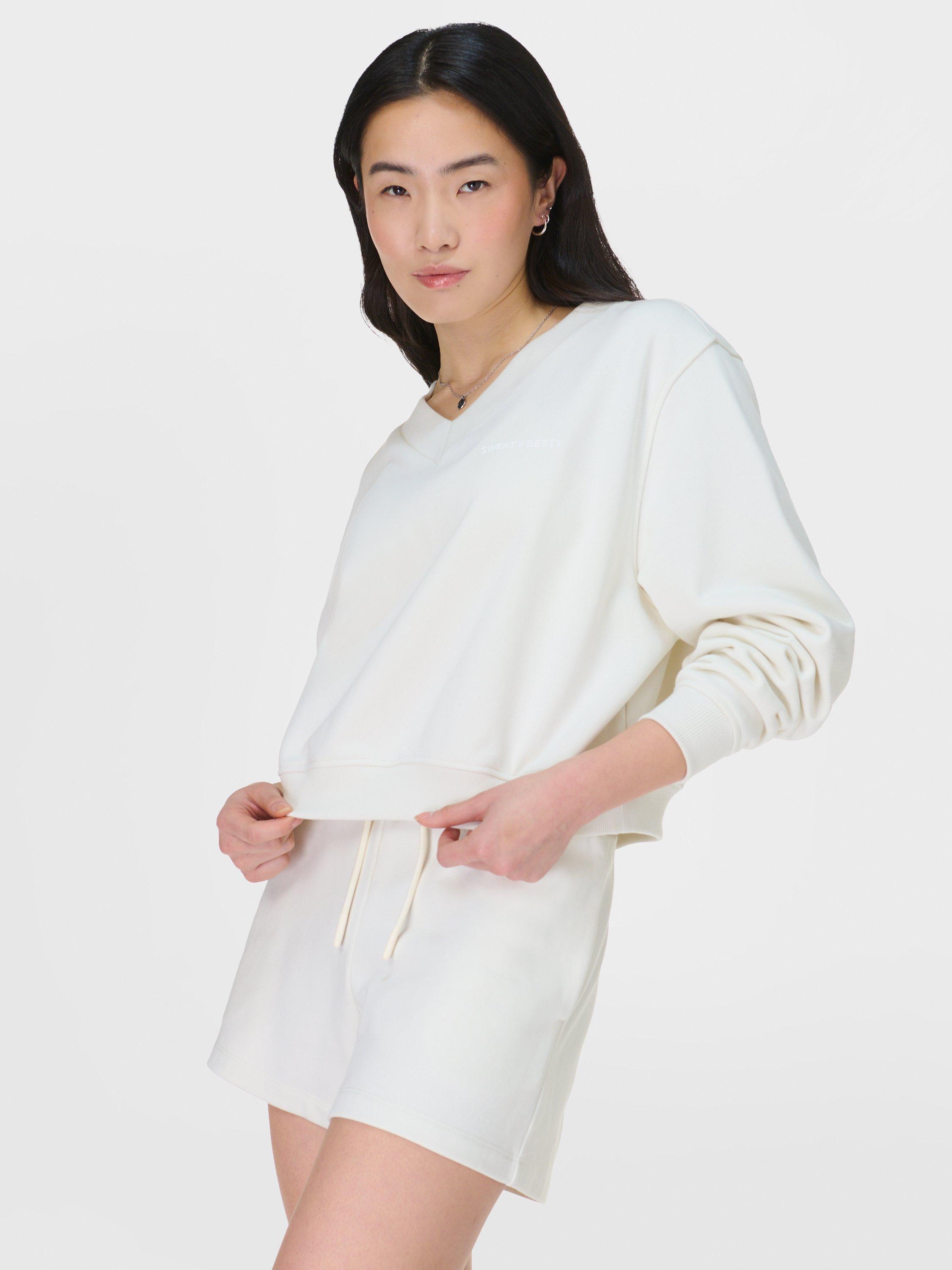 Product image 2 of 7, which shows Sweaty Betty Revive Organic Cotton Rich Cropped Jumper, Lily White, XXS-XS
