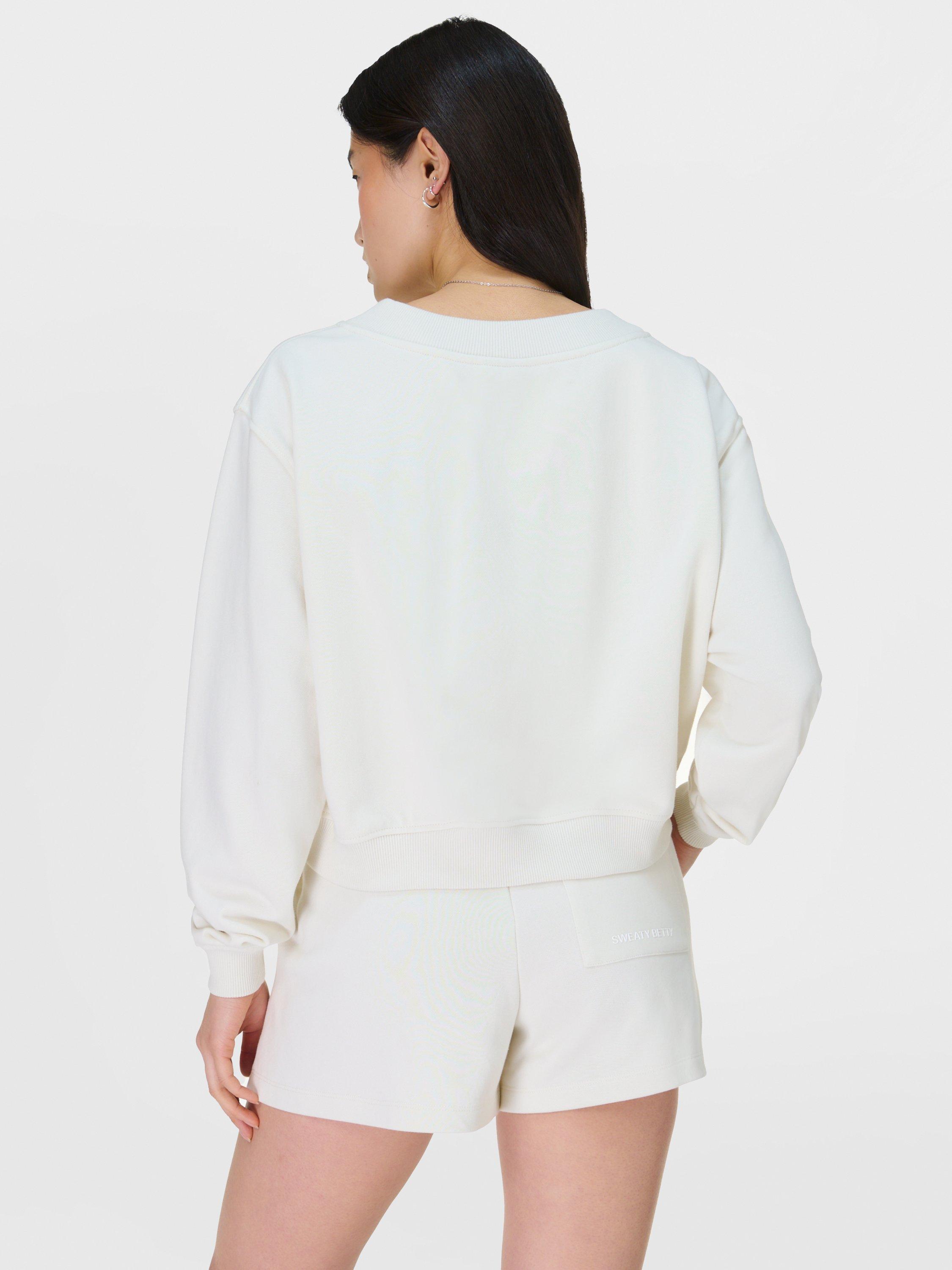 Product image 4 of 7, which shows Sweaty Betty Revive Organic Cotton Rich Cropped Jumper, Lily White, XXS-XS