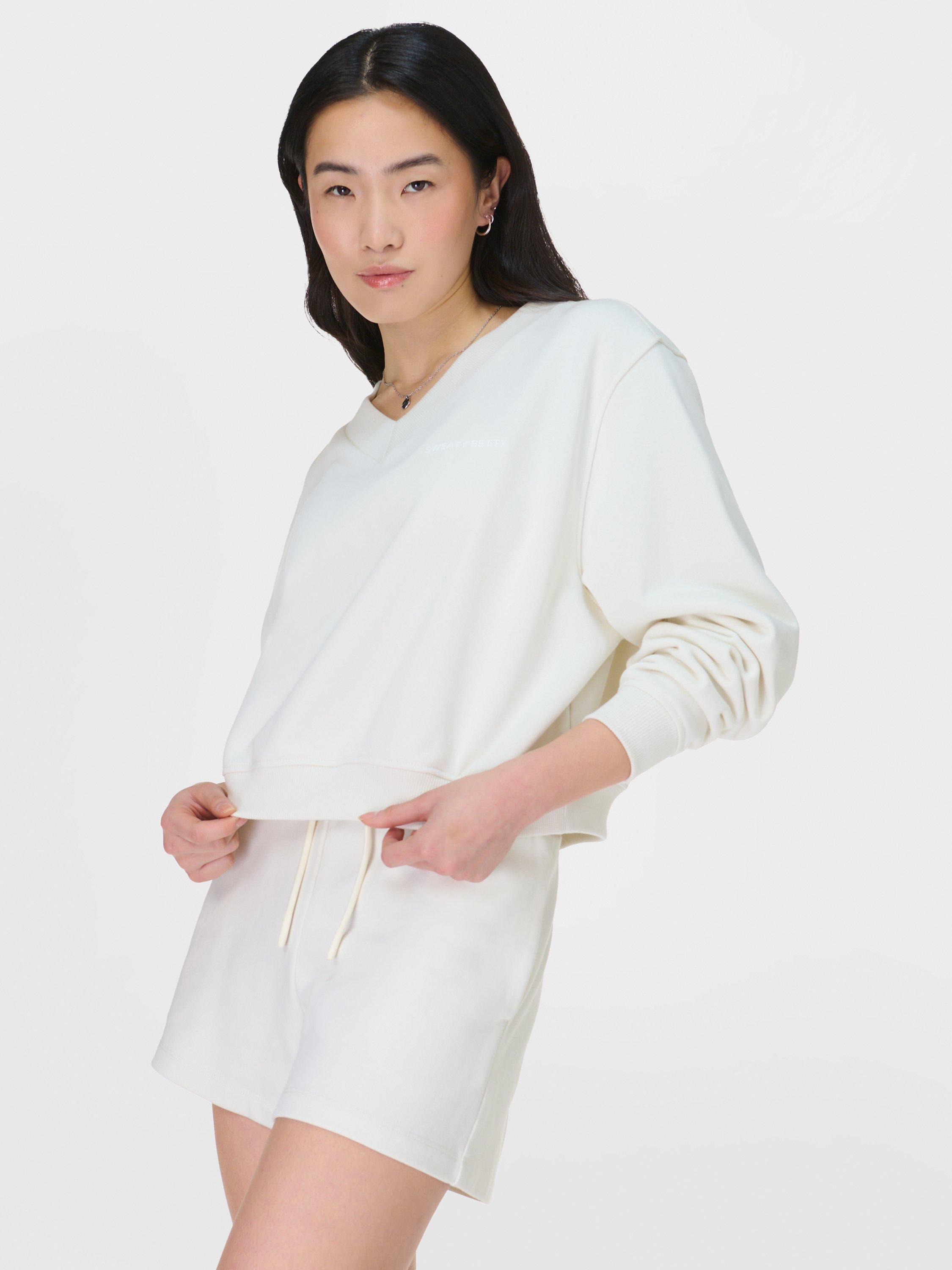 Product image 5 of 7, which shows Sweaty Betty Revive Organic Cotton Rich Cropped Jumper, Lily White, XXS-XS