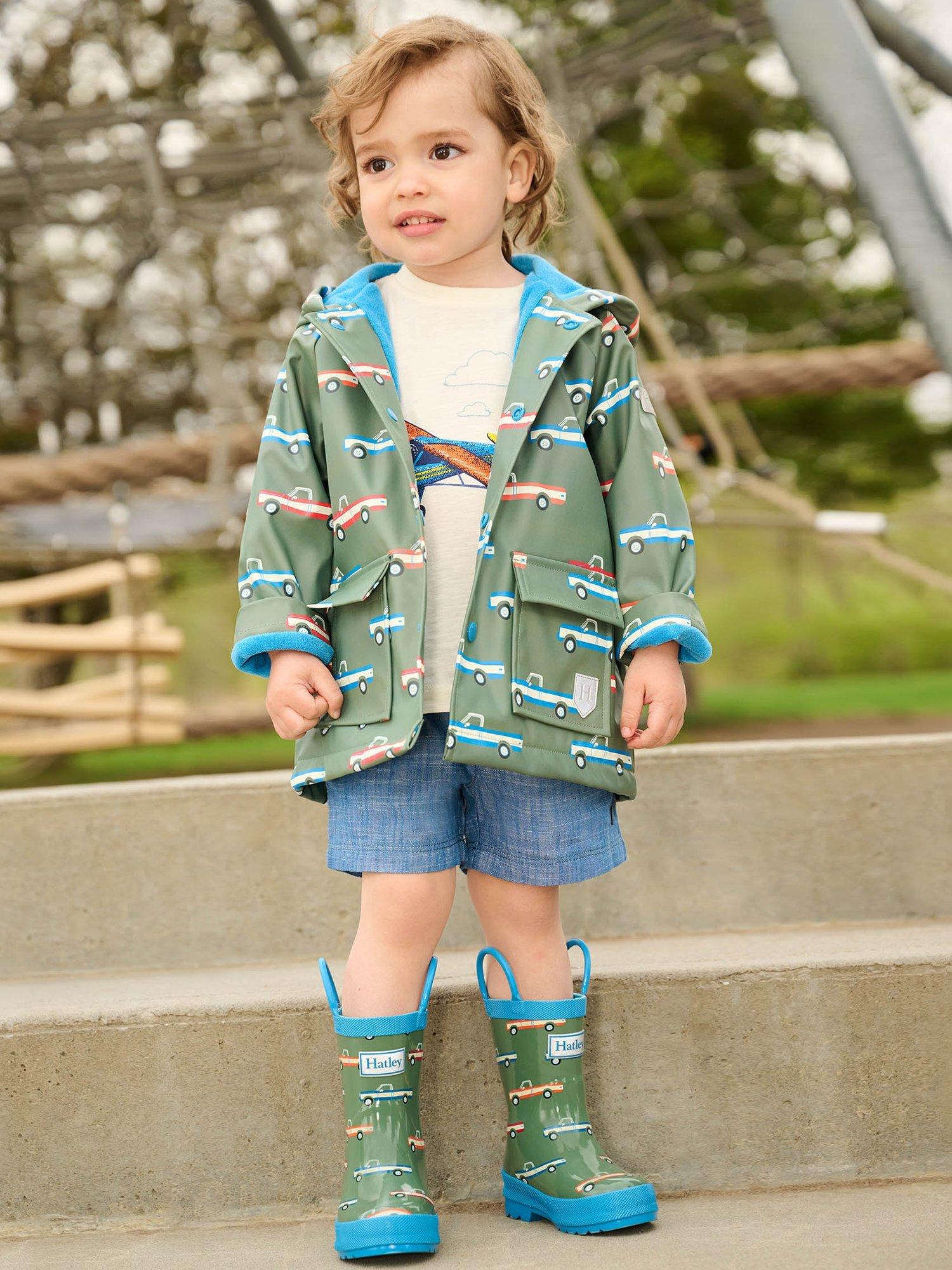 Product image 1 of 3, which shows Hatley Kids' Truck Print Waterproof Hooded Rain Jacket, Comfrey, 6 years