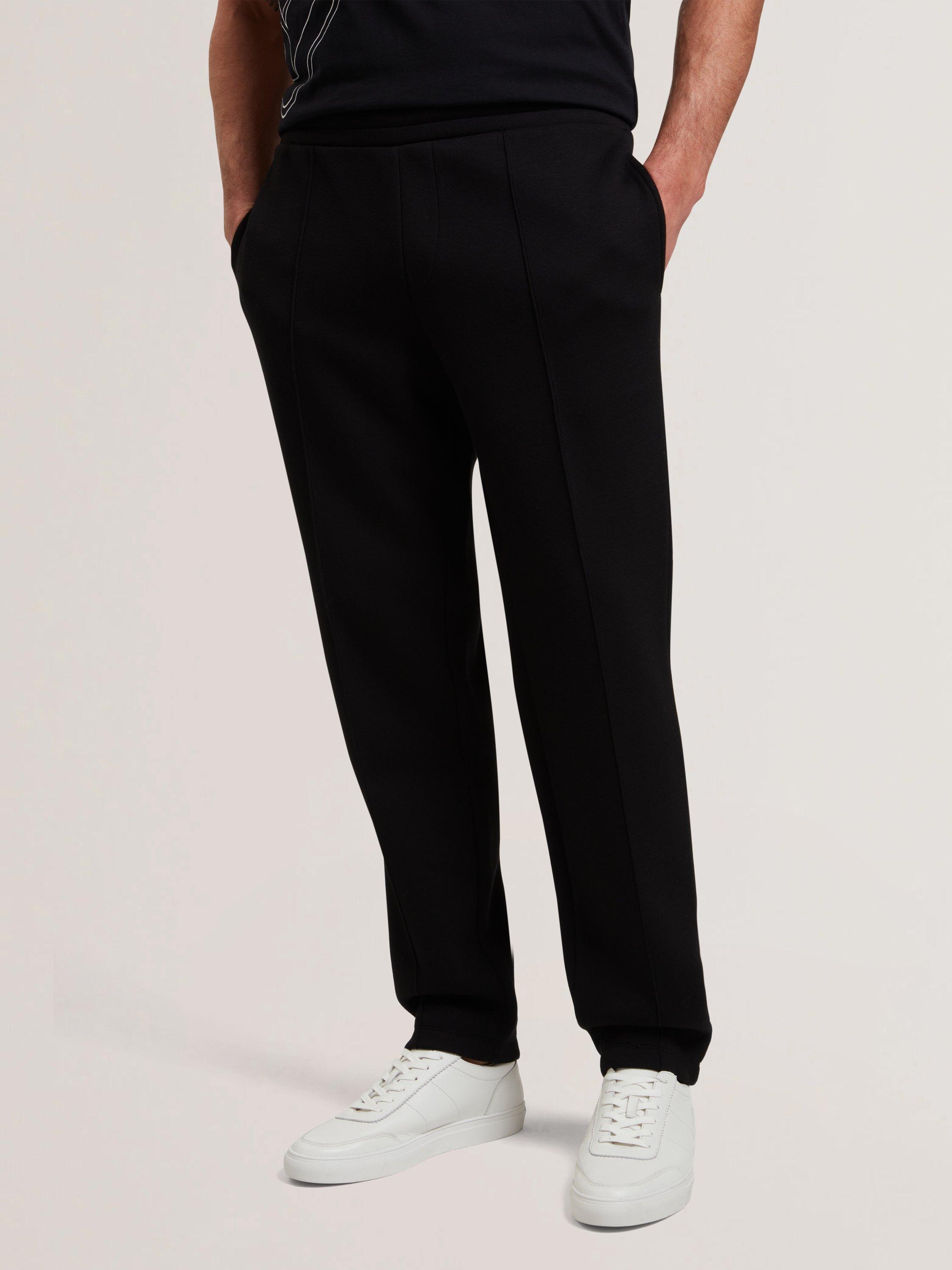 Product image 1 of 6, which shows Ted Baker Neo Slim Fit Joggers Trousers, Black, XS