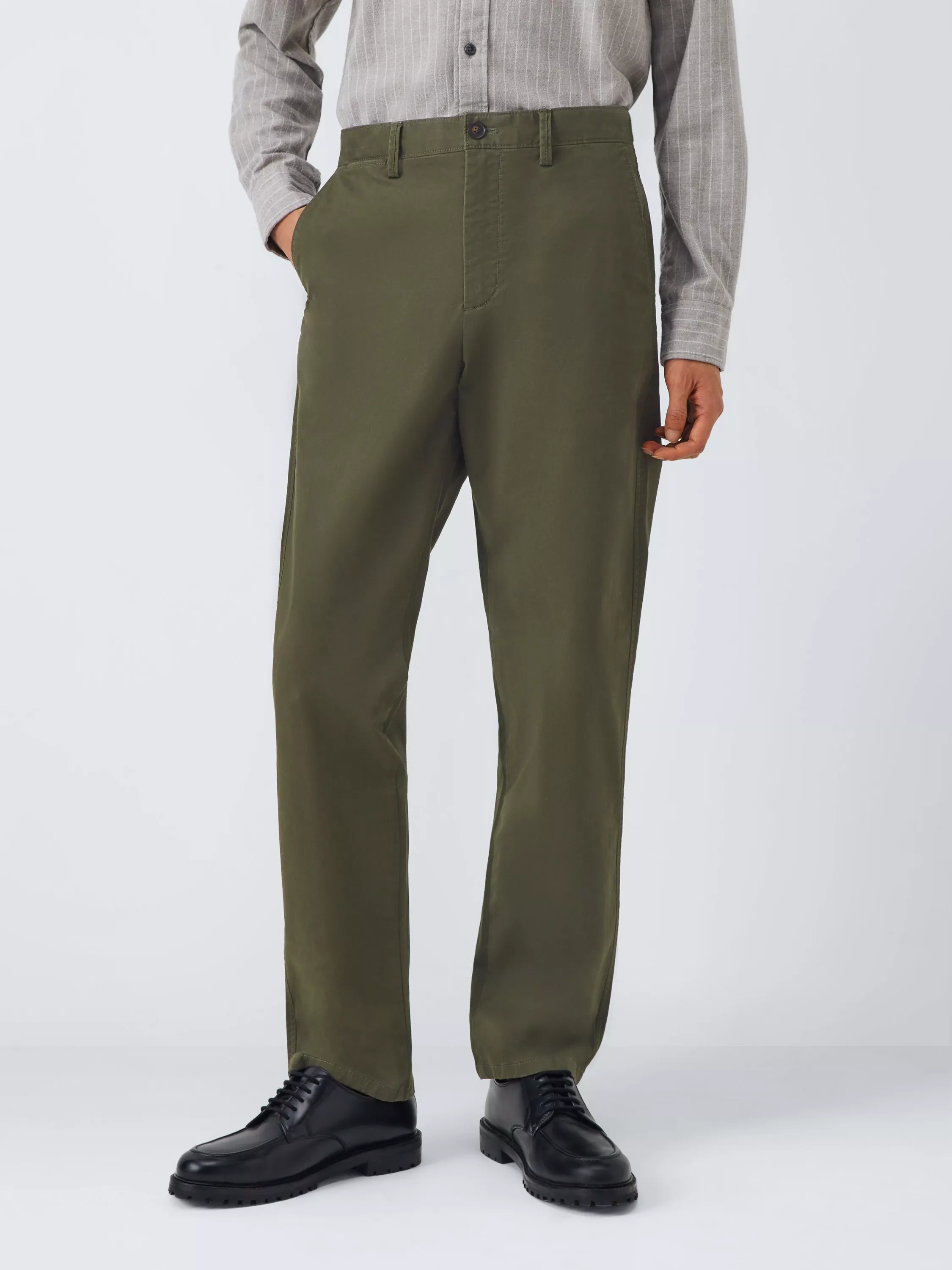 Men’s olive green straight-leg chinos with button waist, styled with striped shirt and black leather shoes