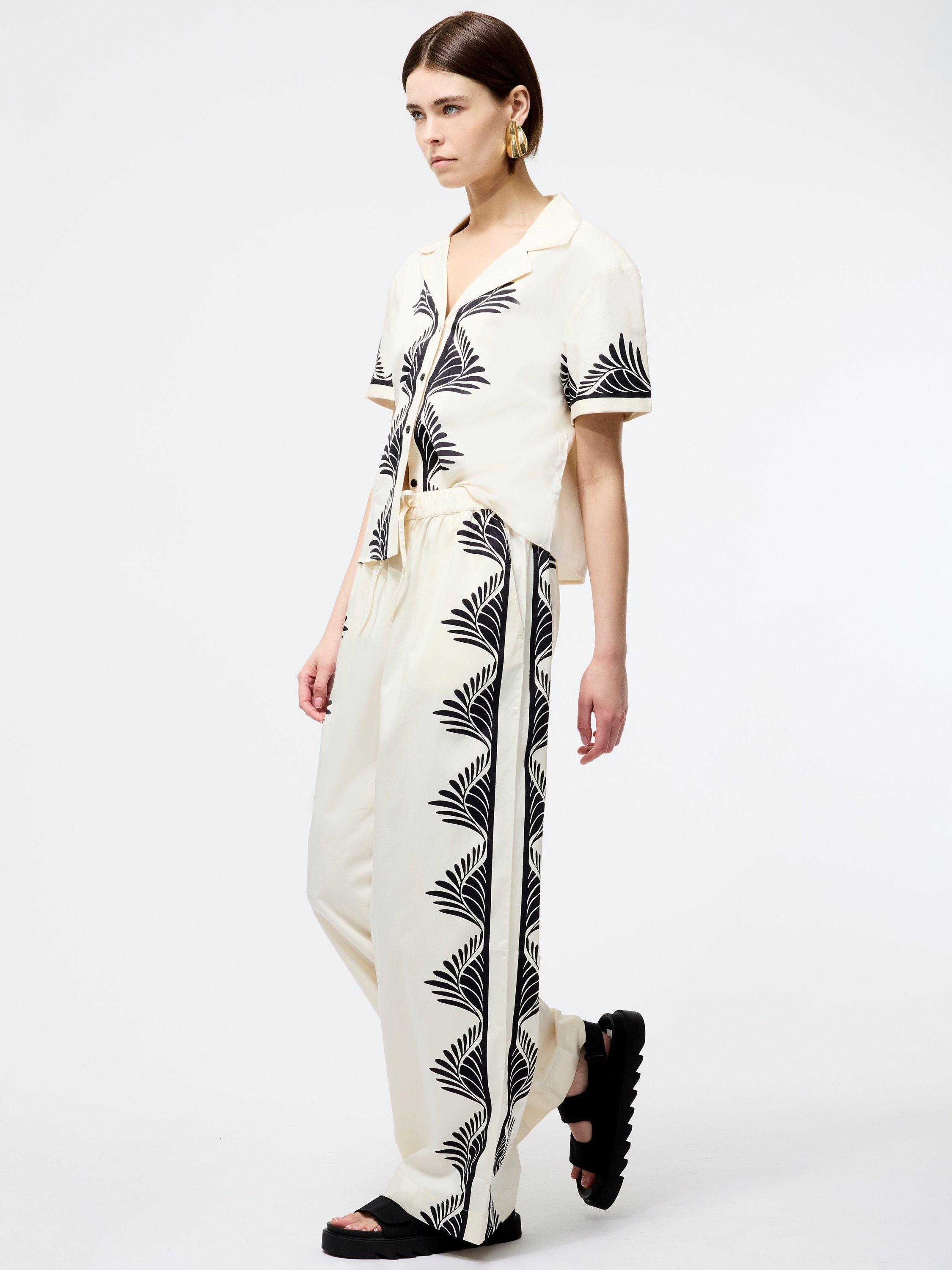 Product image 2 of 5, which shows French Connection Nola Alexis Printed Trousers, Cream/Black, M