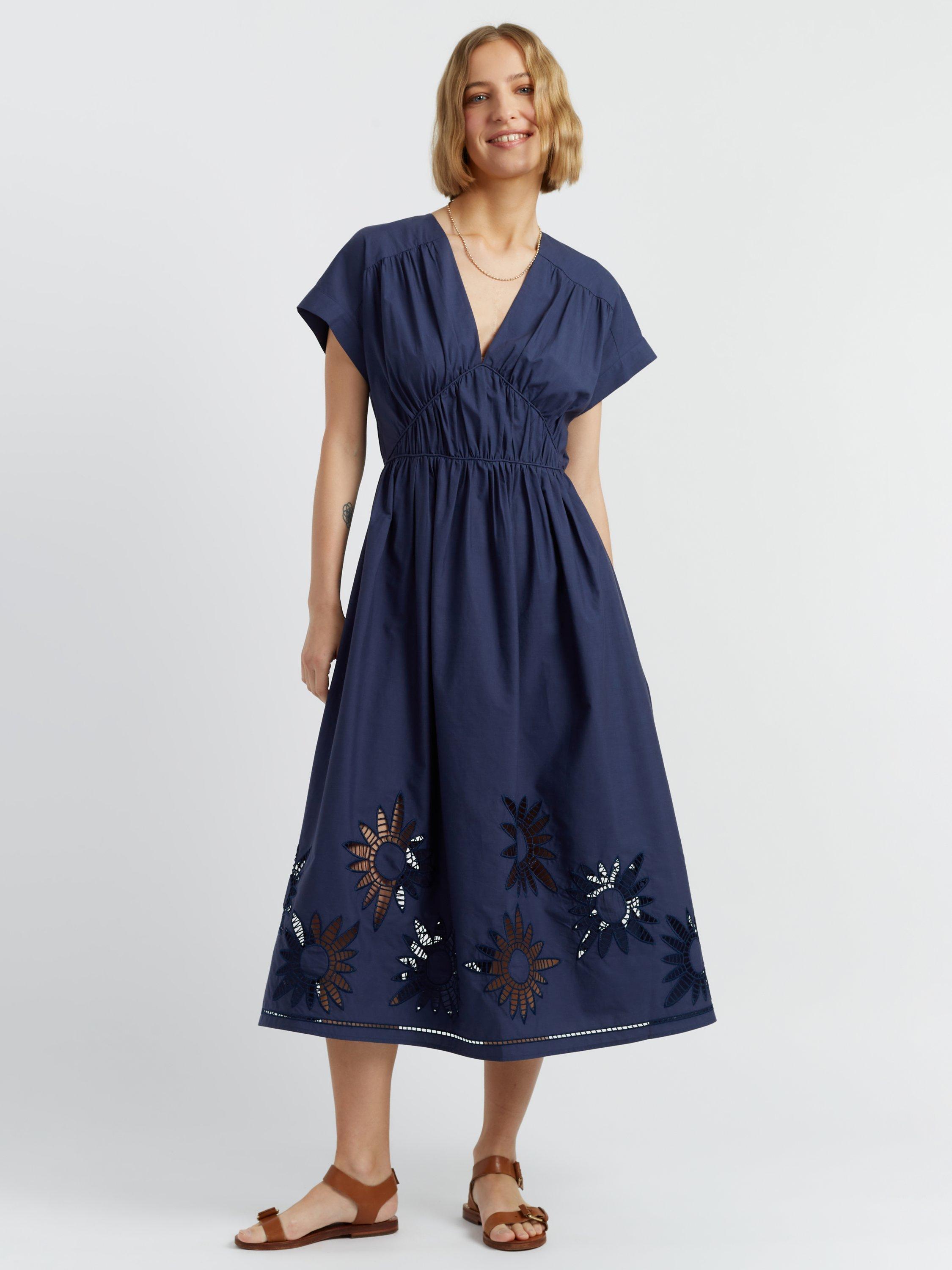 Product image 1 of 5, which shows Chinti & Parker Broderie Cotton Empire Line Midi Dress, Navy, 6
