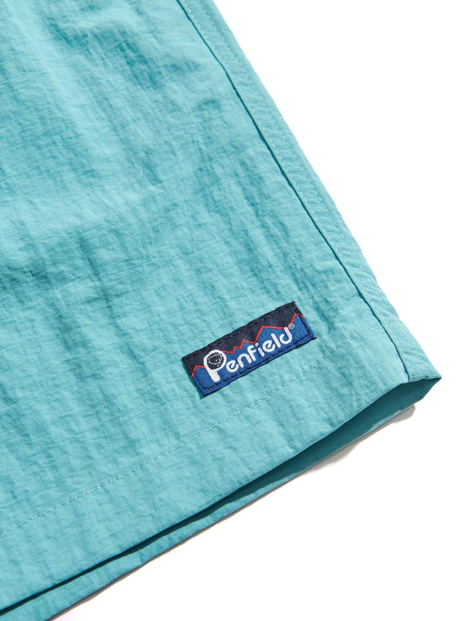 Product image 7 of 10, which shows Penfield Packable Swim Shorts, Dusty Turquoise, S