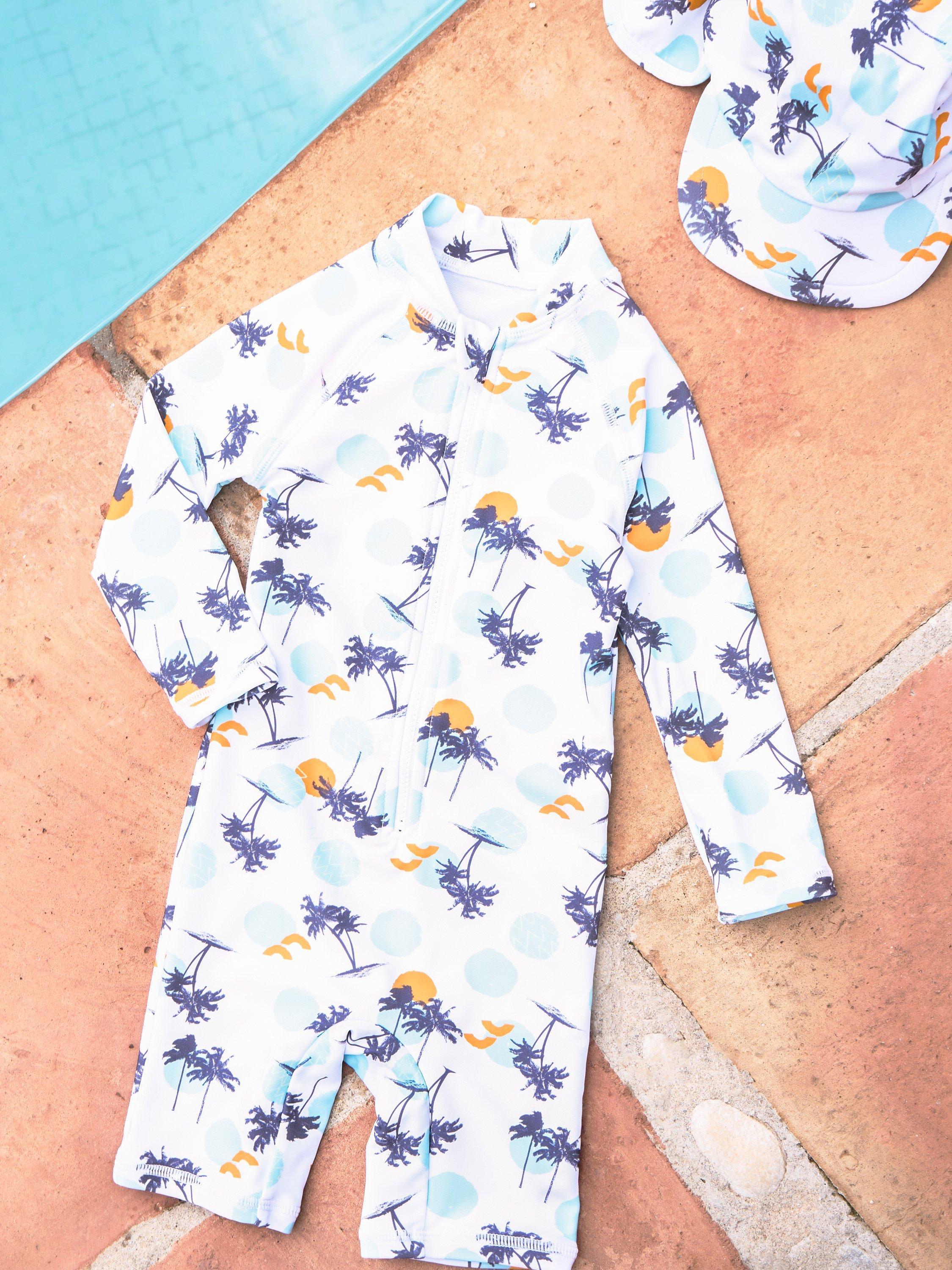 Product image 4 of 4, which shows Angel & Rocket Baby Brody Sun-Safe Print Swimsuit, Multi, 3-6 months