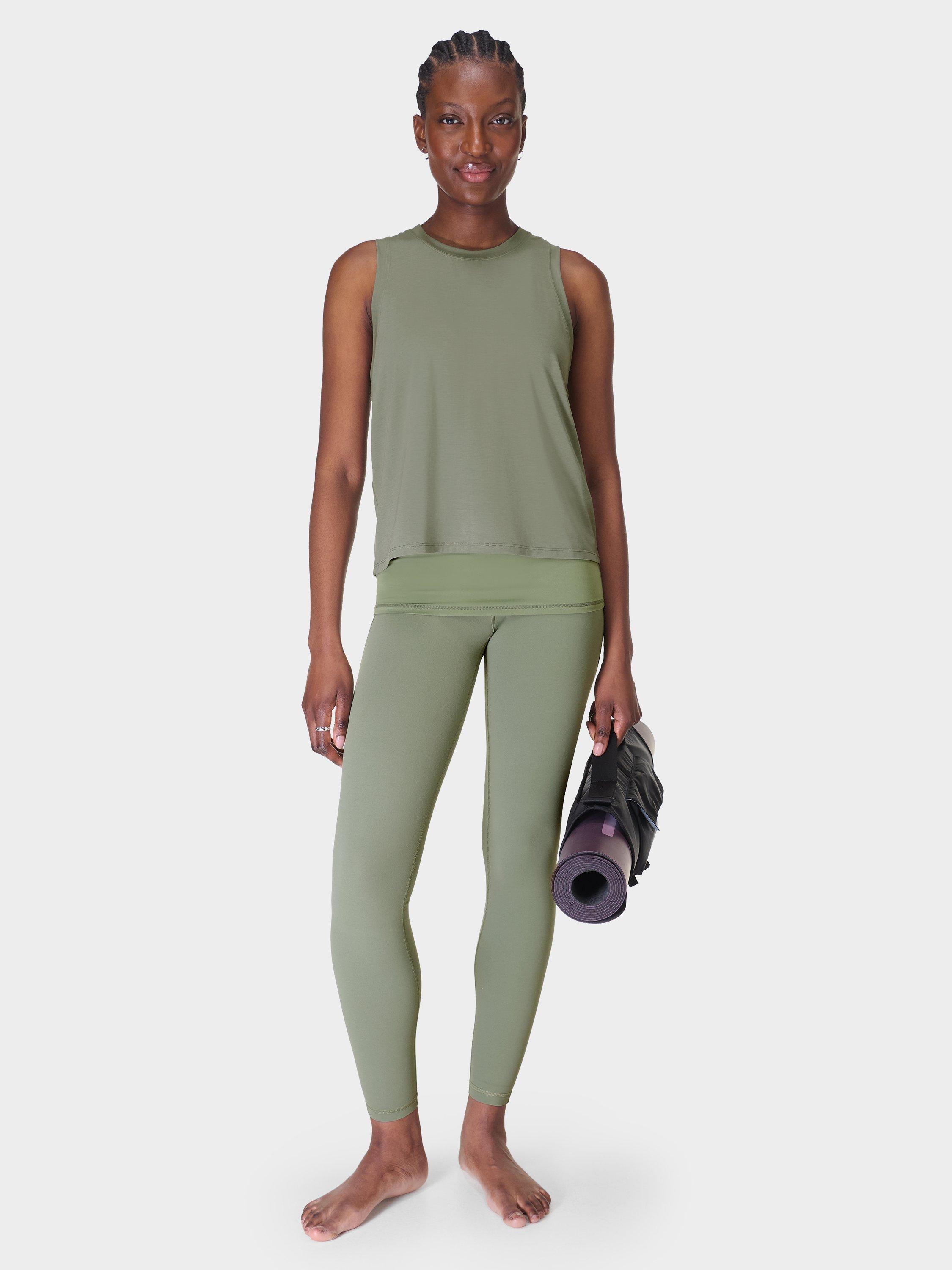 Product image 4 of 9, which shows Sweaty Betty Soft Flow 2-in-1 Bra Tank Top, Willow Green, XXS