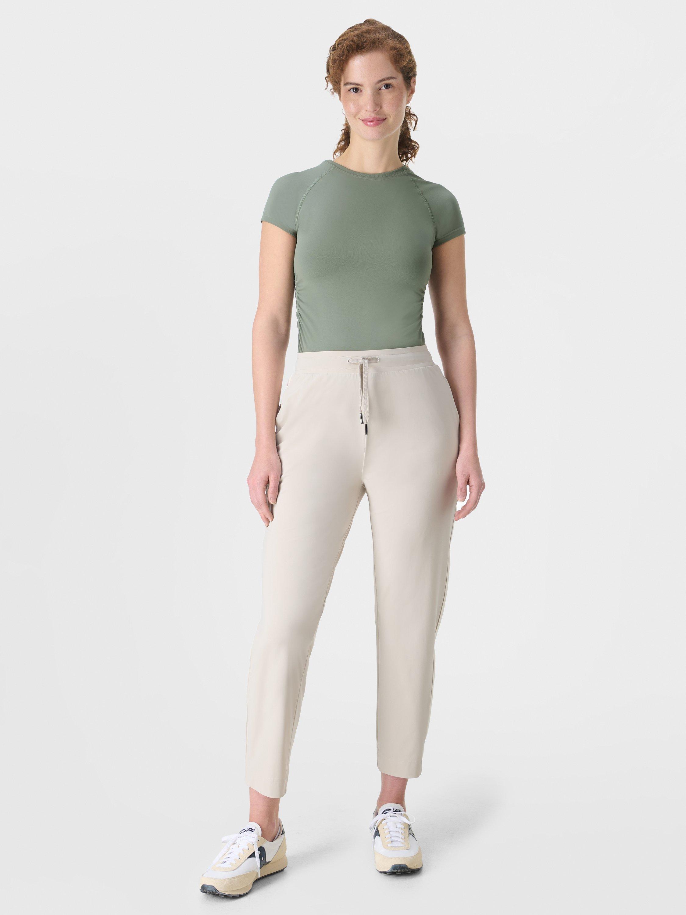Product image 4 of 7, which shows Sweaty Betty Explorer Side Stripe 25" Trousers, Mineral Beige, XS