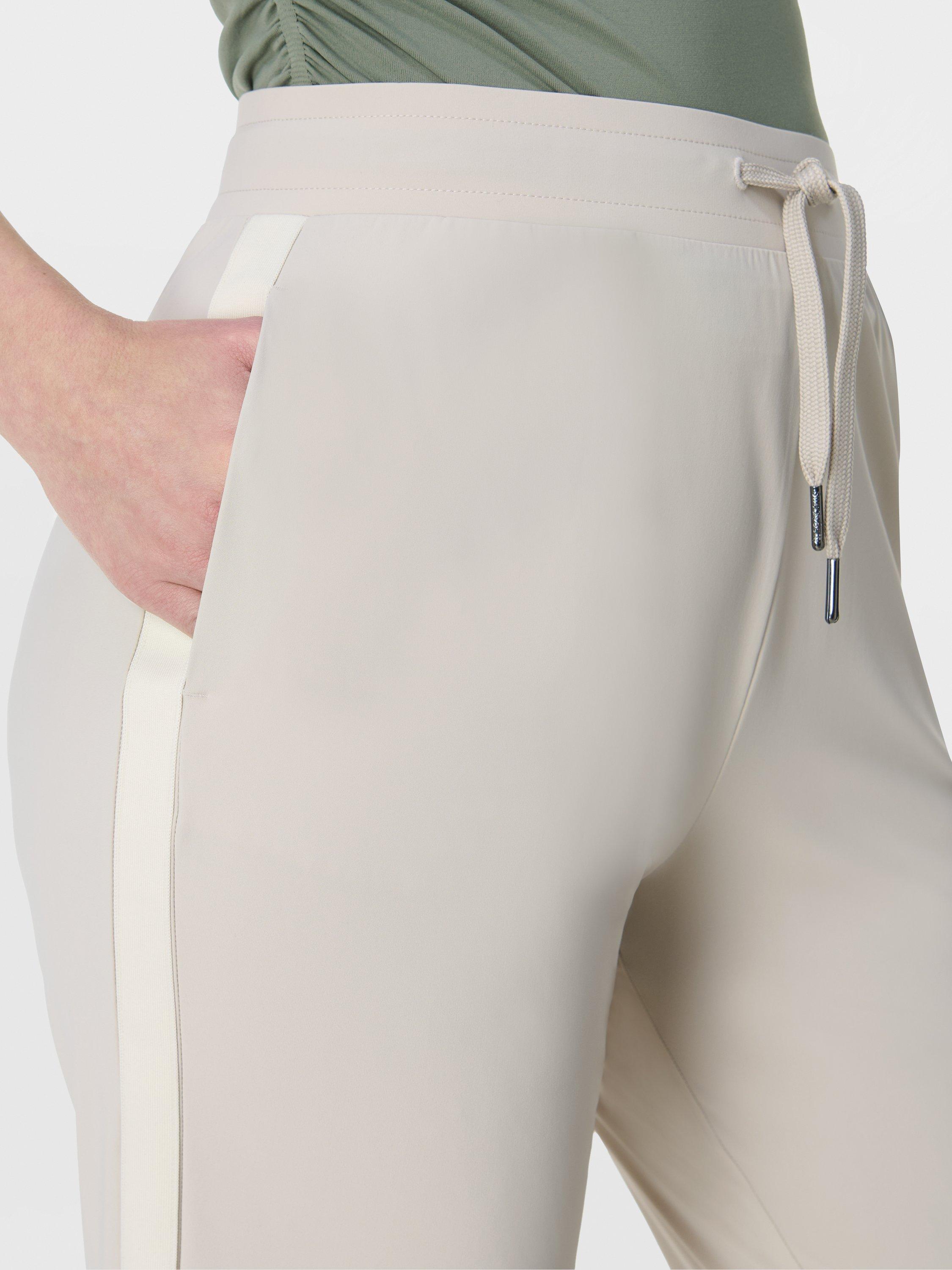 Product image 5 of 7, which shows Sweaty Betty Explorer Side Stripe 25" Trousers, Mineral Beige, XS