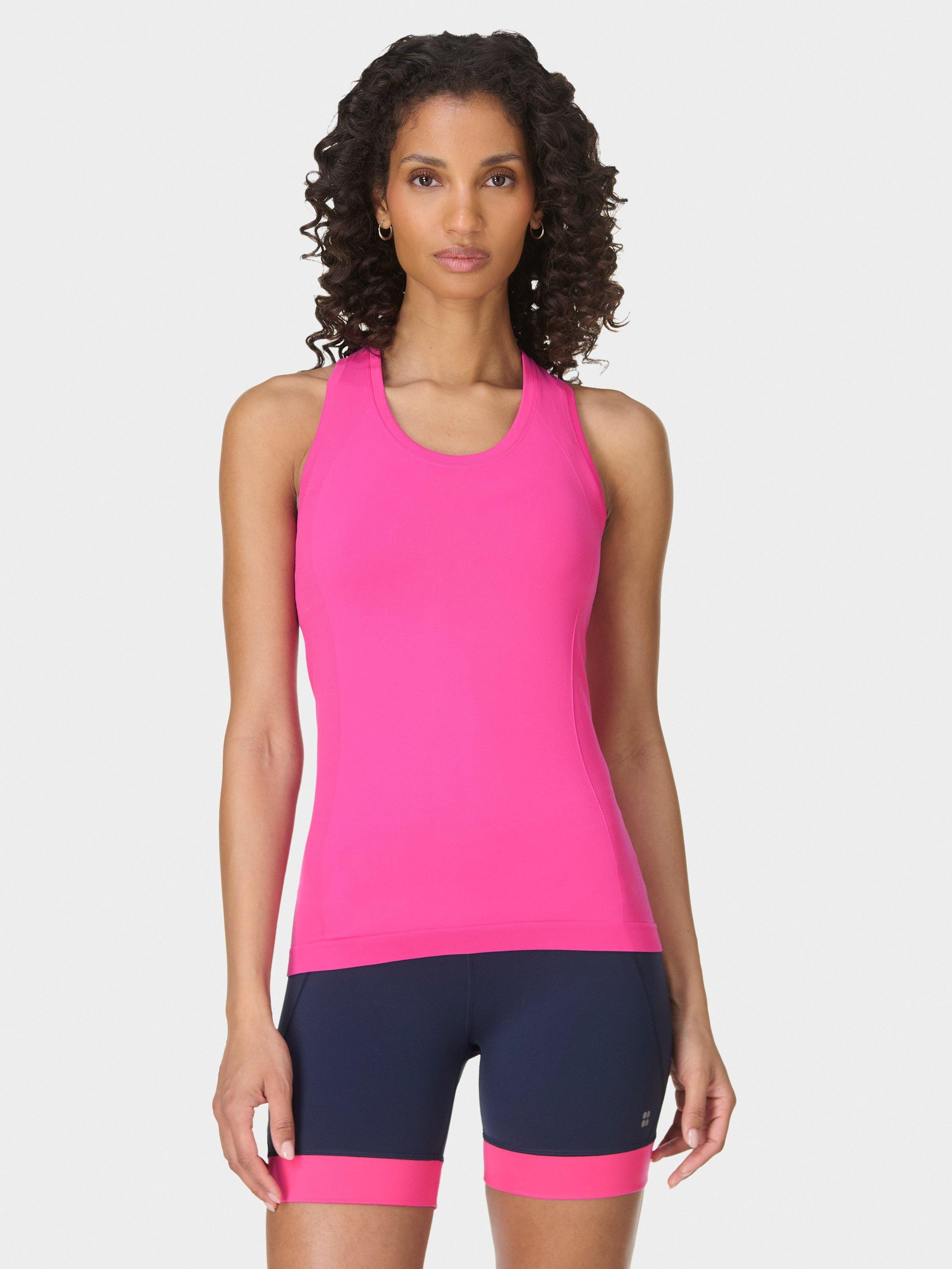 Product image 1 of 7, which shows Sweaty Betty Athlete Seamless Workout Tank Top, Fuchsia Pink, XXS