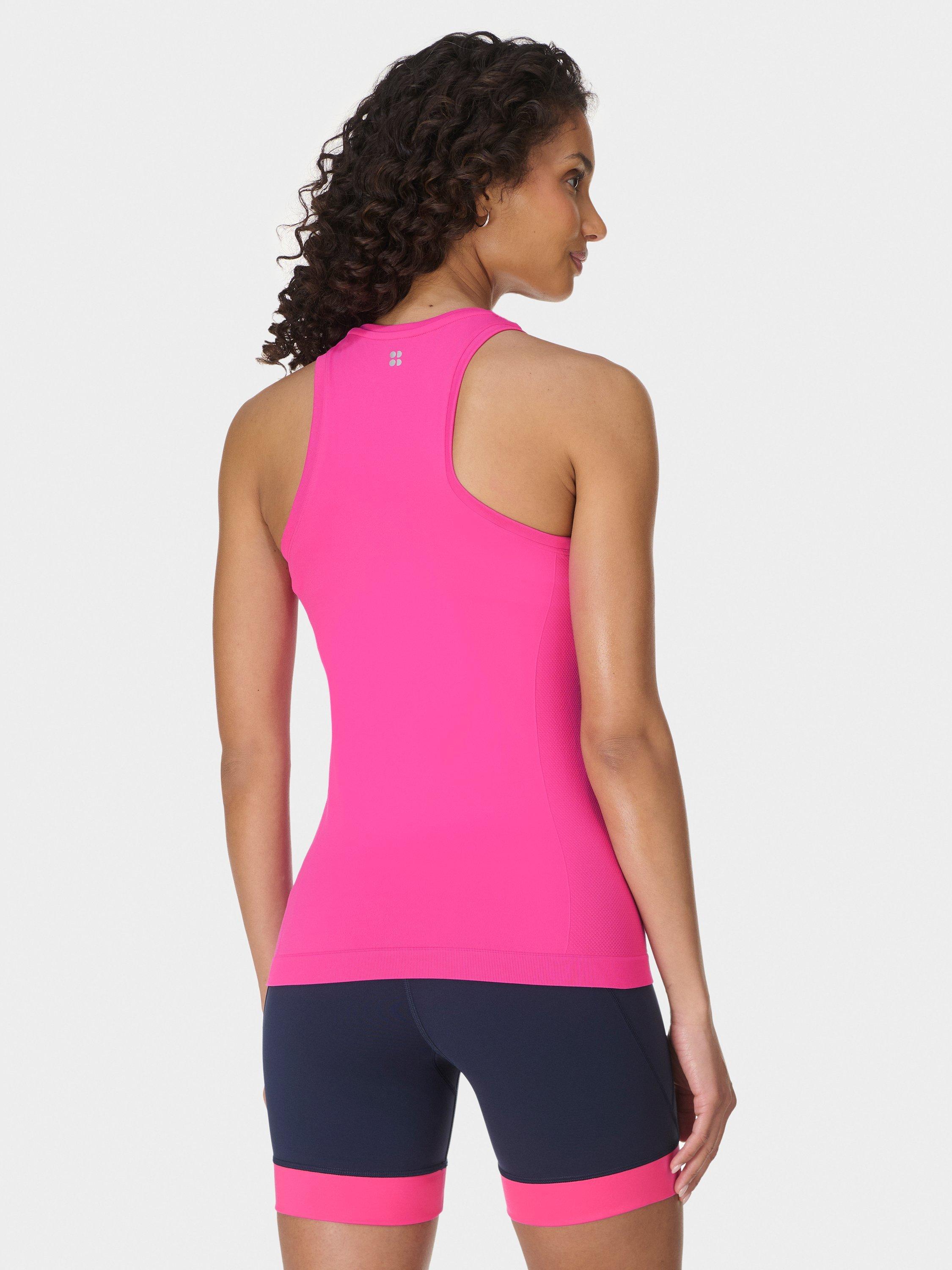 Product image 4 of 7, which shows Sweaty Betty Athlete Seamless Workout Tank Top, Fuchsia Pink, XXS